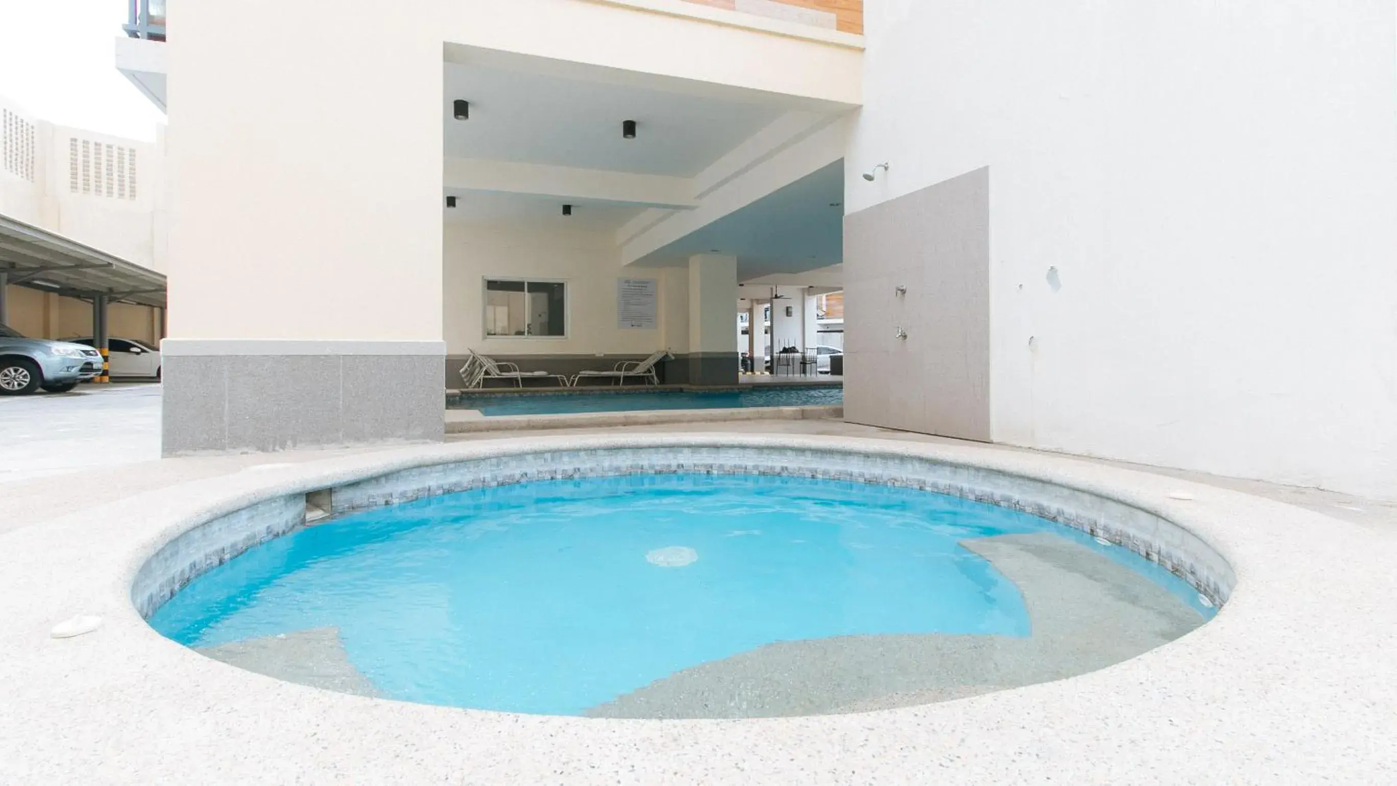 Pool view in RedDoorz Plus at Alpina Heights Paranaque Pool view in RedDoorz Plus at Alpina Heights Paranaque