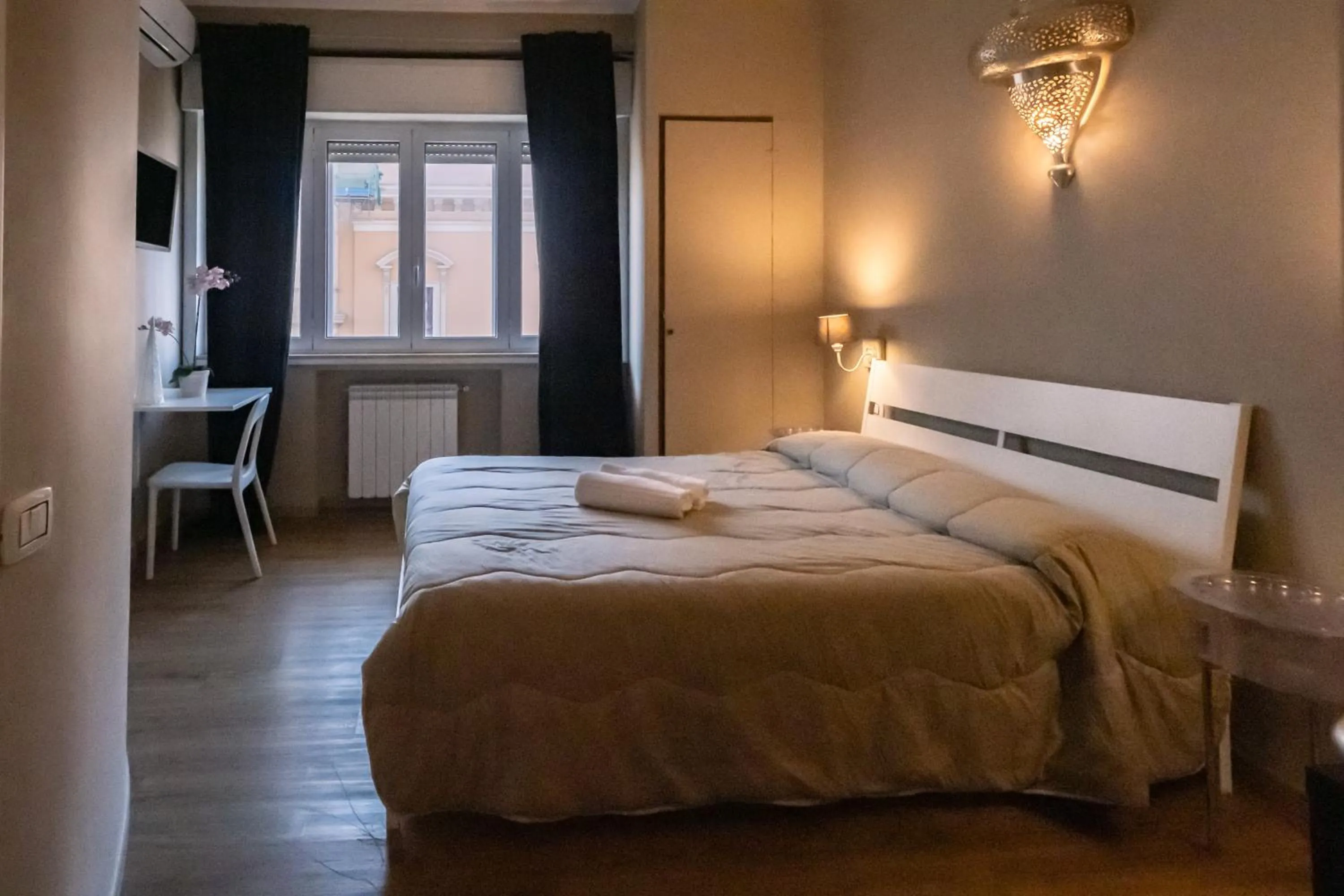 Bed in CconfortHotels R&B Cavour