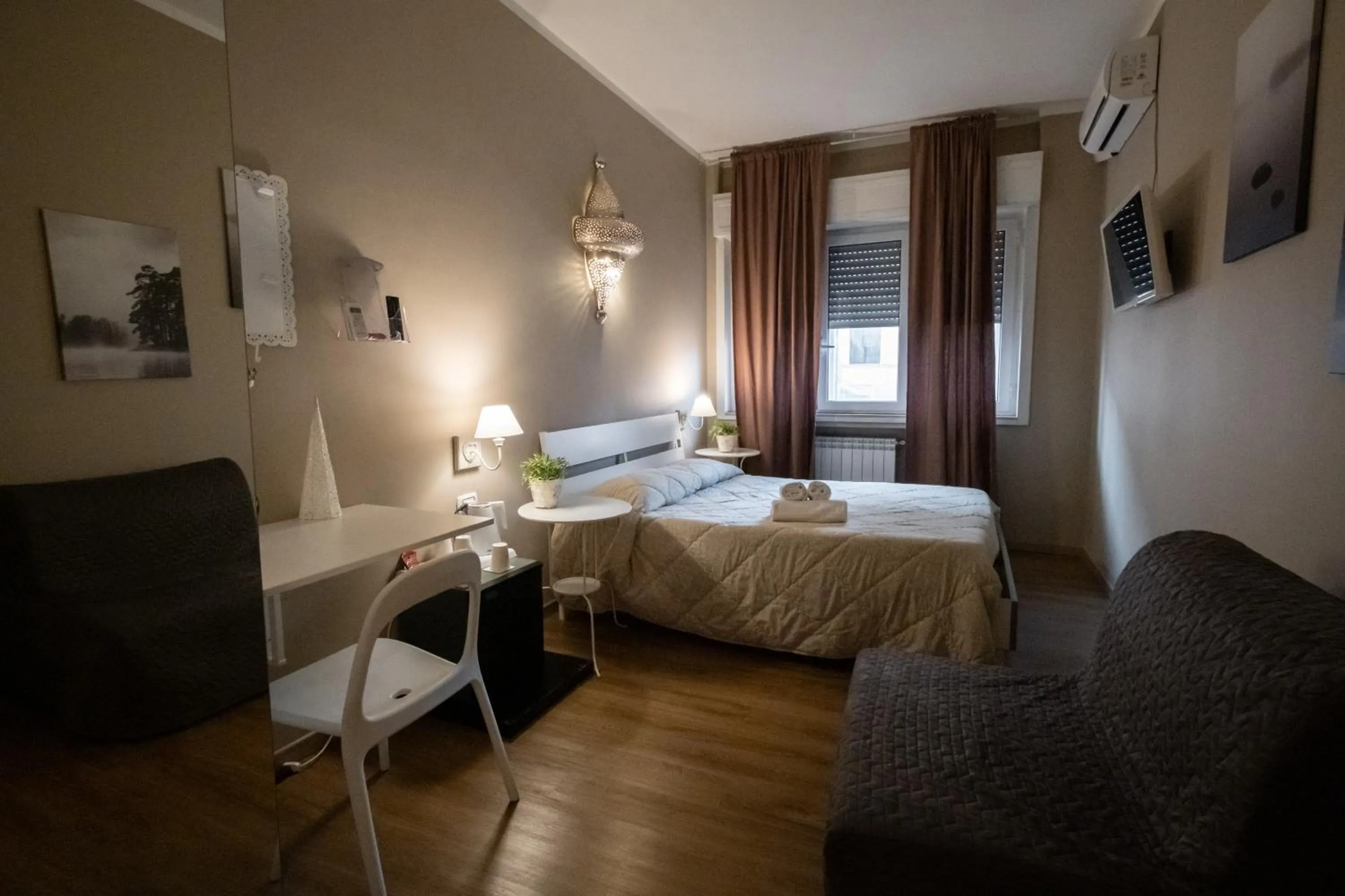 Bed in CconfortHotels R&B Cavour