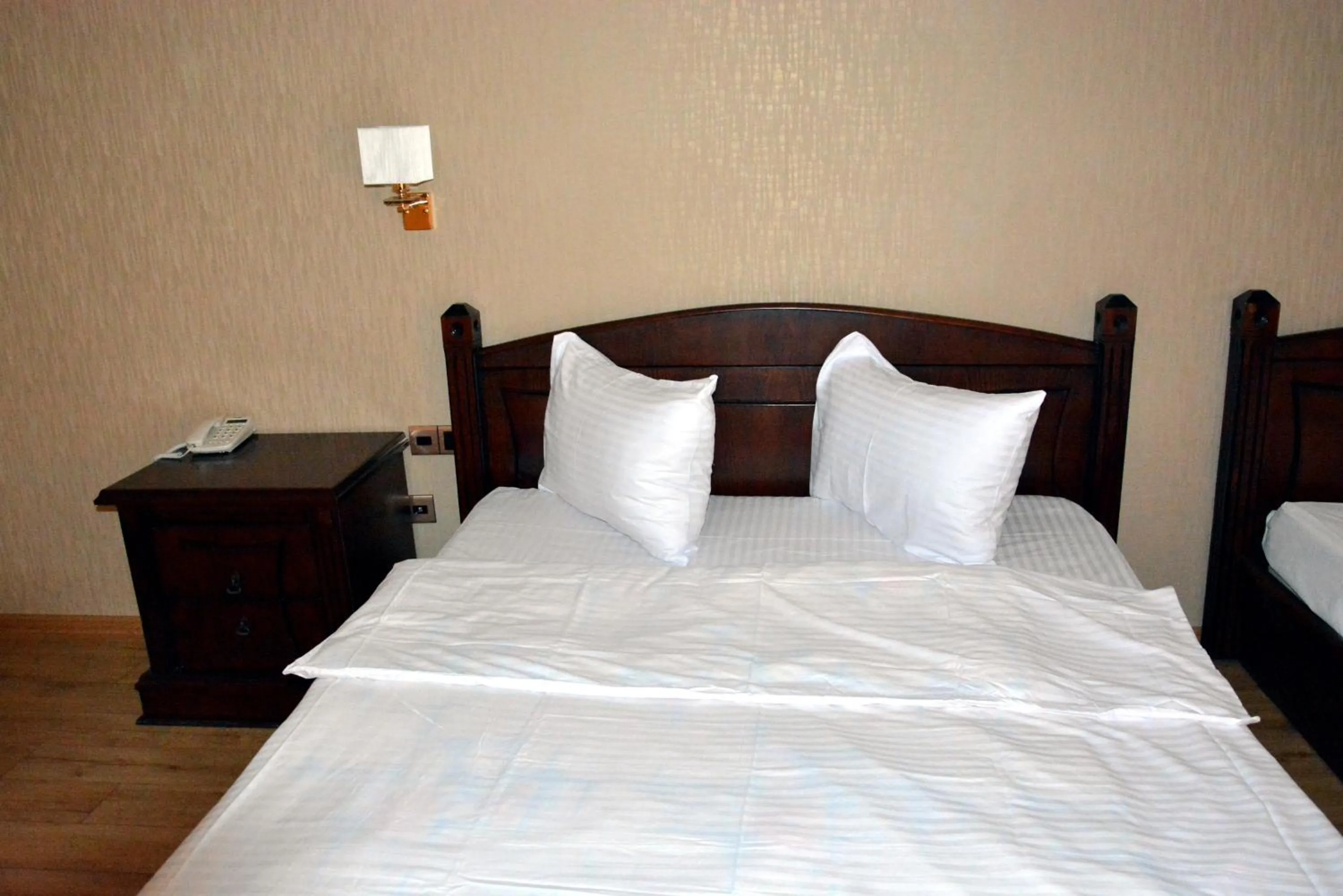 Property building, Bed in Deluxe Hotel Ganja