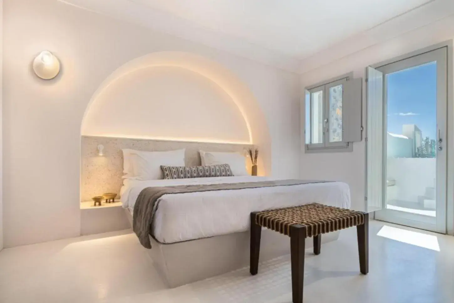 Bed in Akra Suites & Spa Bed in Akra Suites & Spa