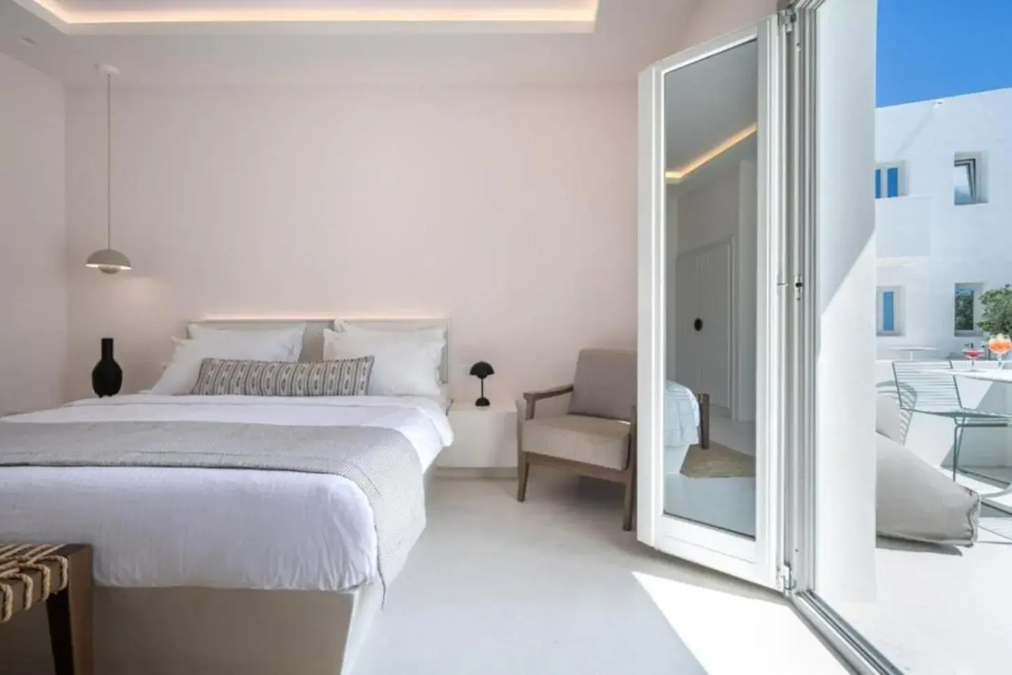 Bed in Akra Suites & Spa Bed in Akra Suites & Spa