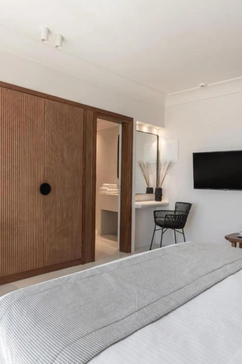 Bed in Akra Suites & Spa