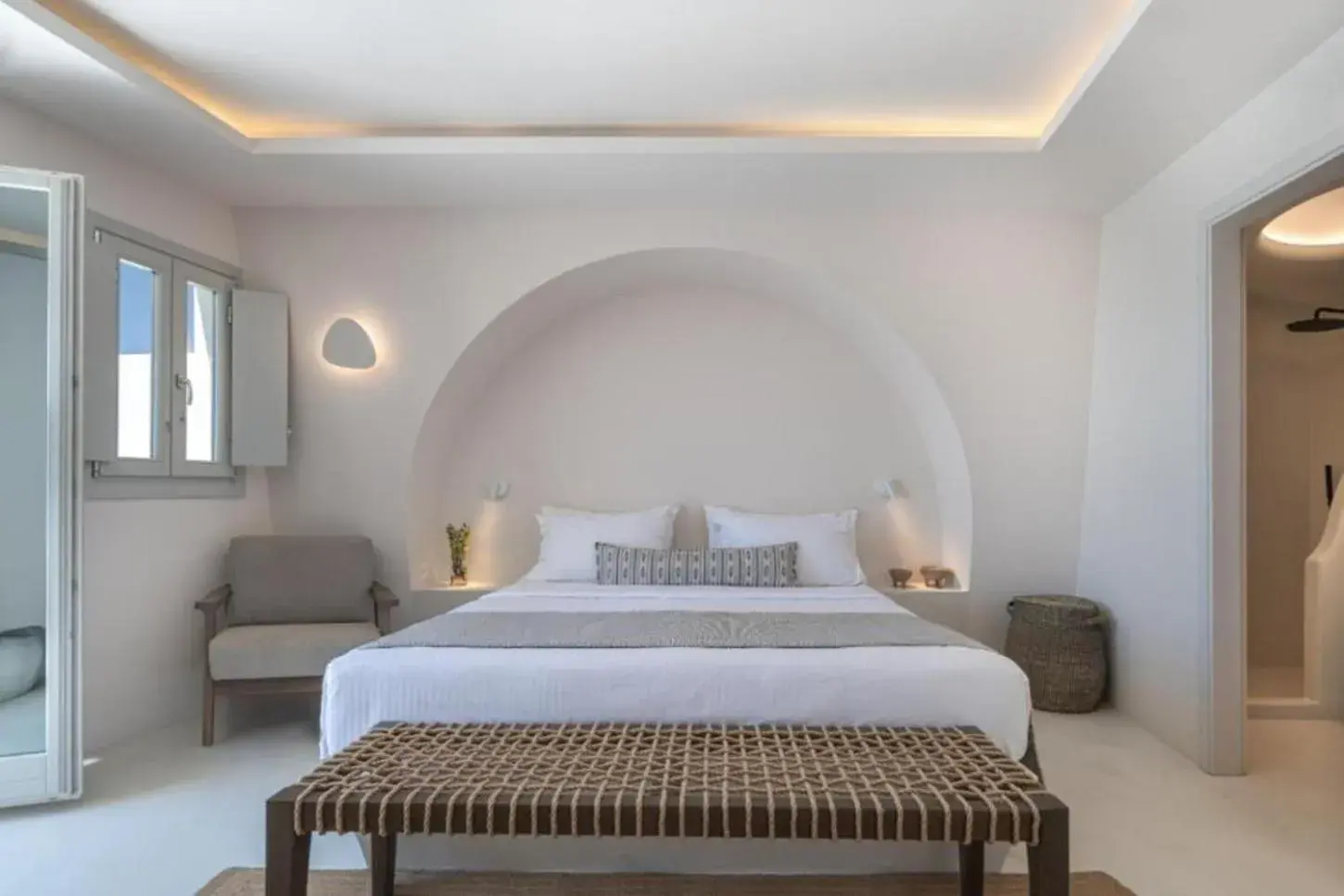 Bed in Akra Suites & Spa Bed in Akra Suites & Spa