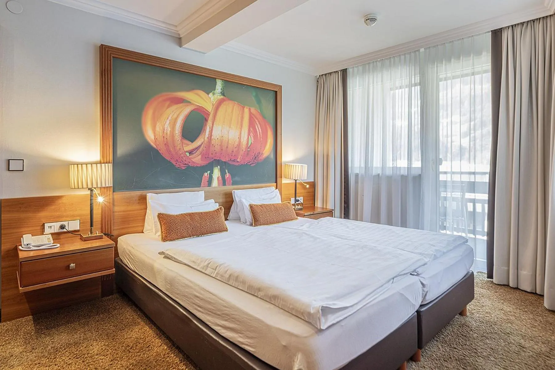 Bed in EUROPÄISCHER HOF Bad Gastein