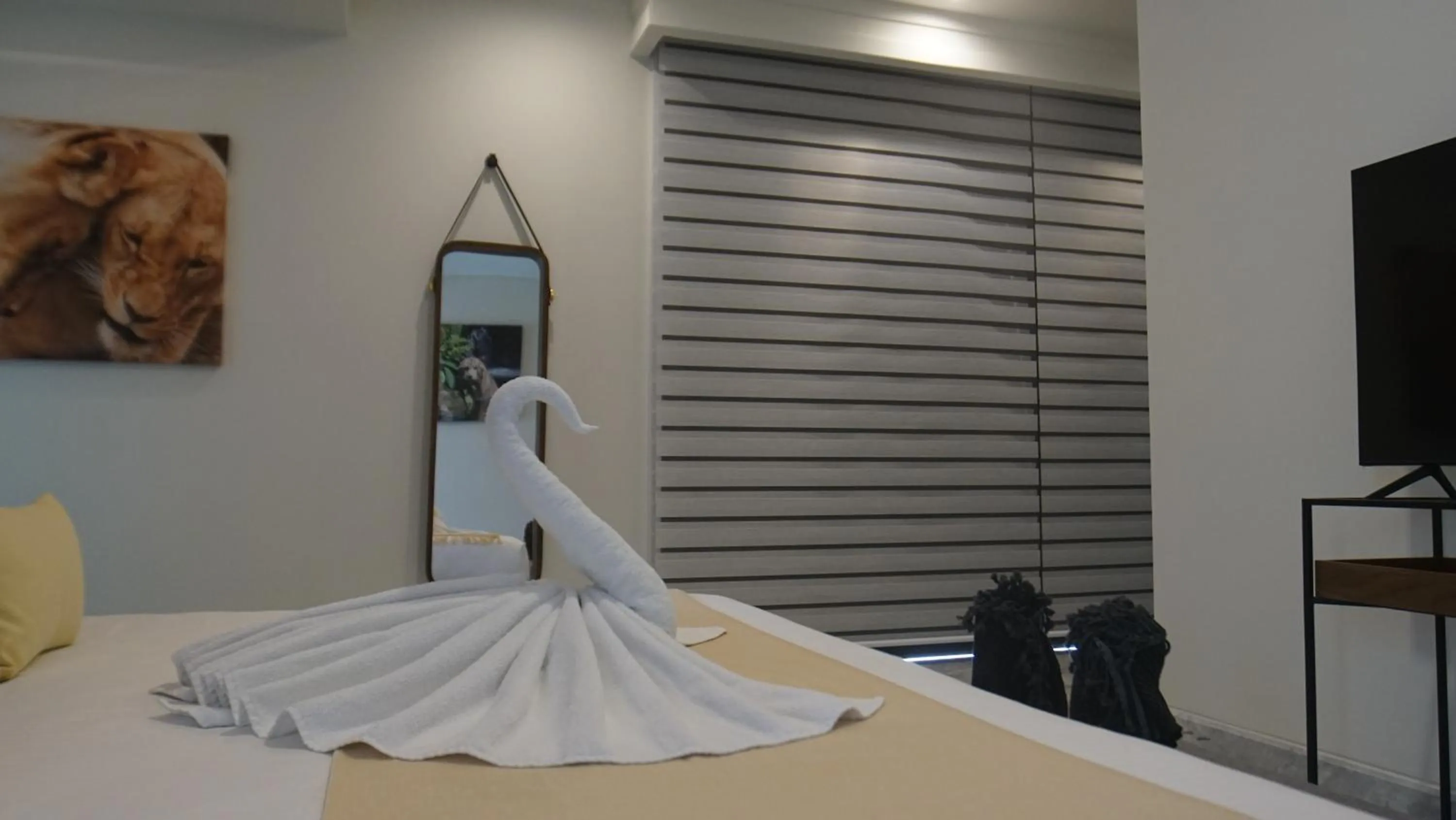 Bed in Panther Bay Boutique Hotel