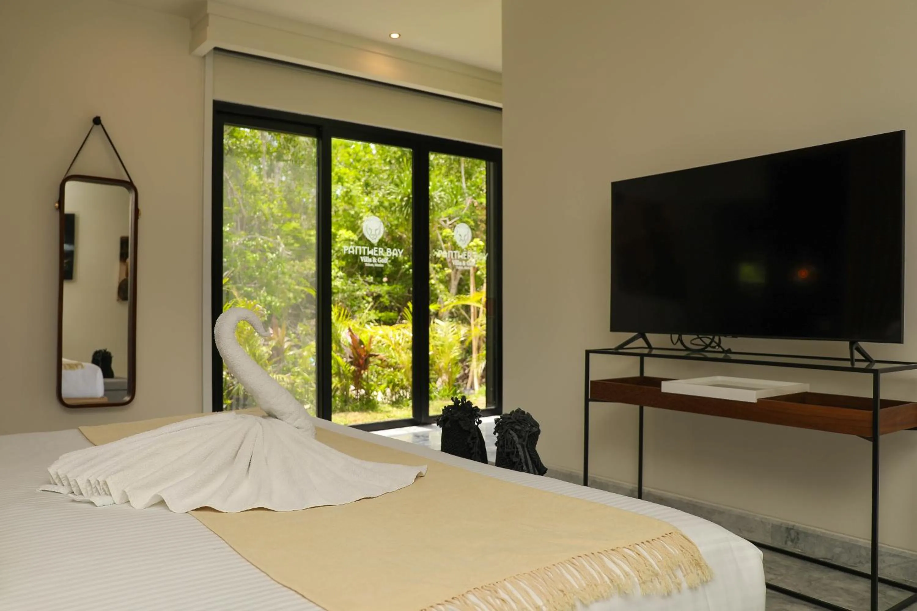 Bed in Panther Bay Boutique Hotel