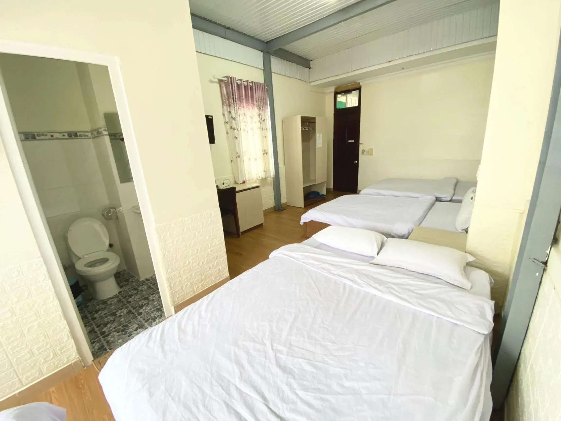 Property building, Bed in Sao Mai Tim Hotel Property building, Bed in Sao Mai Tim Hotel