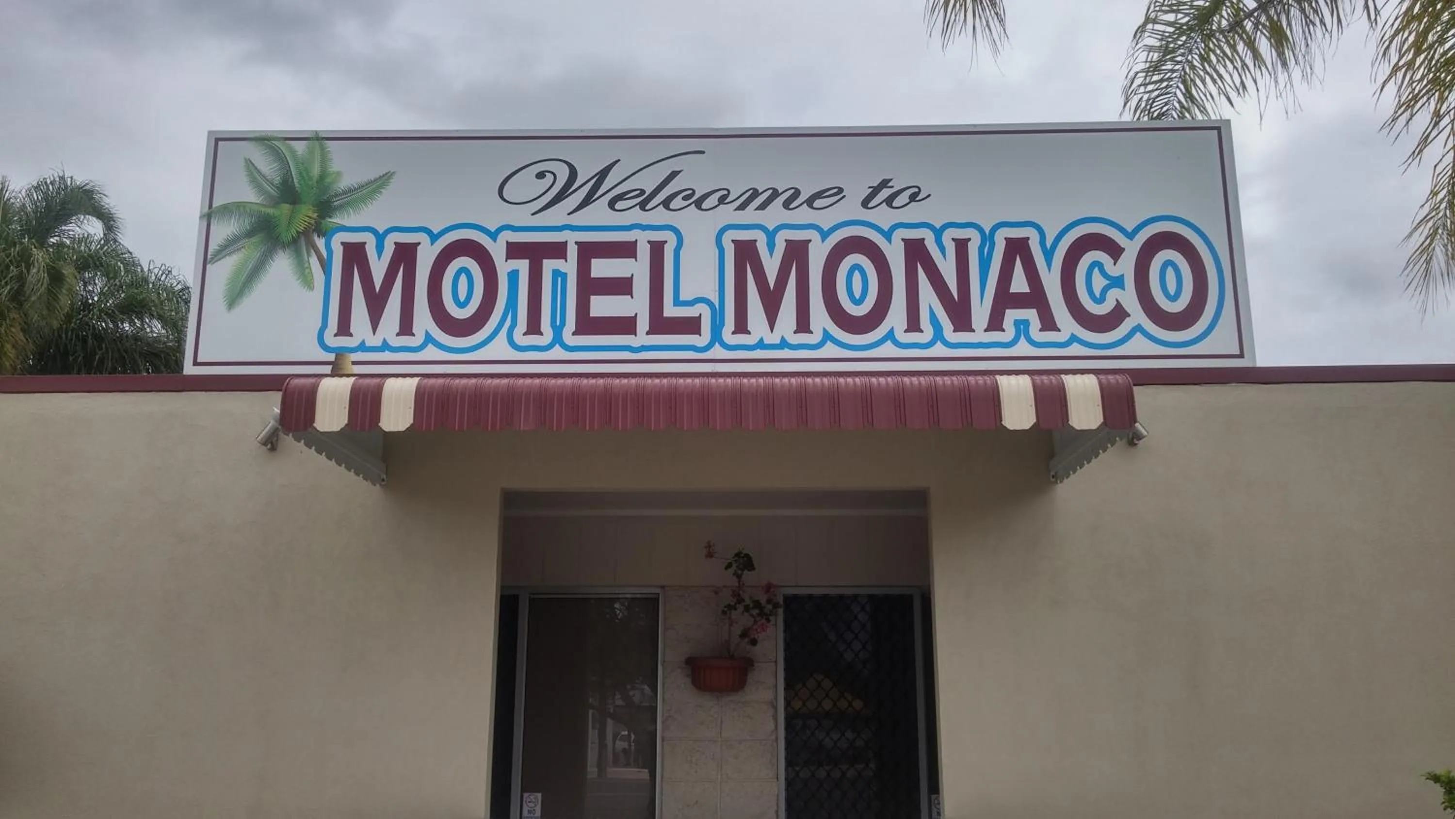 Property logo or sign in Motel Monaco