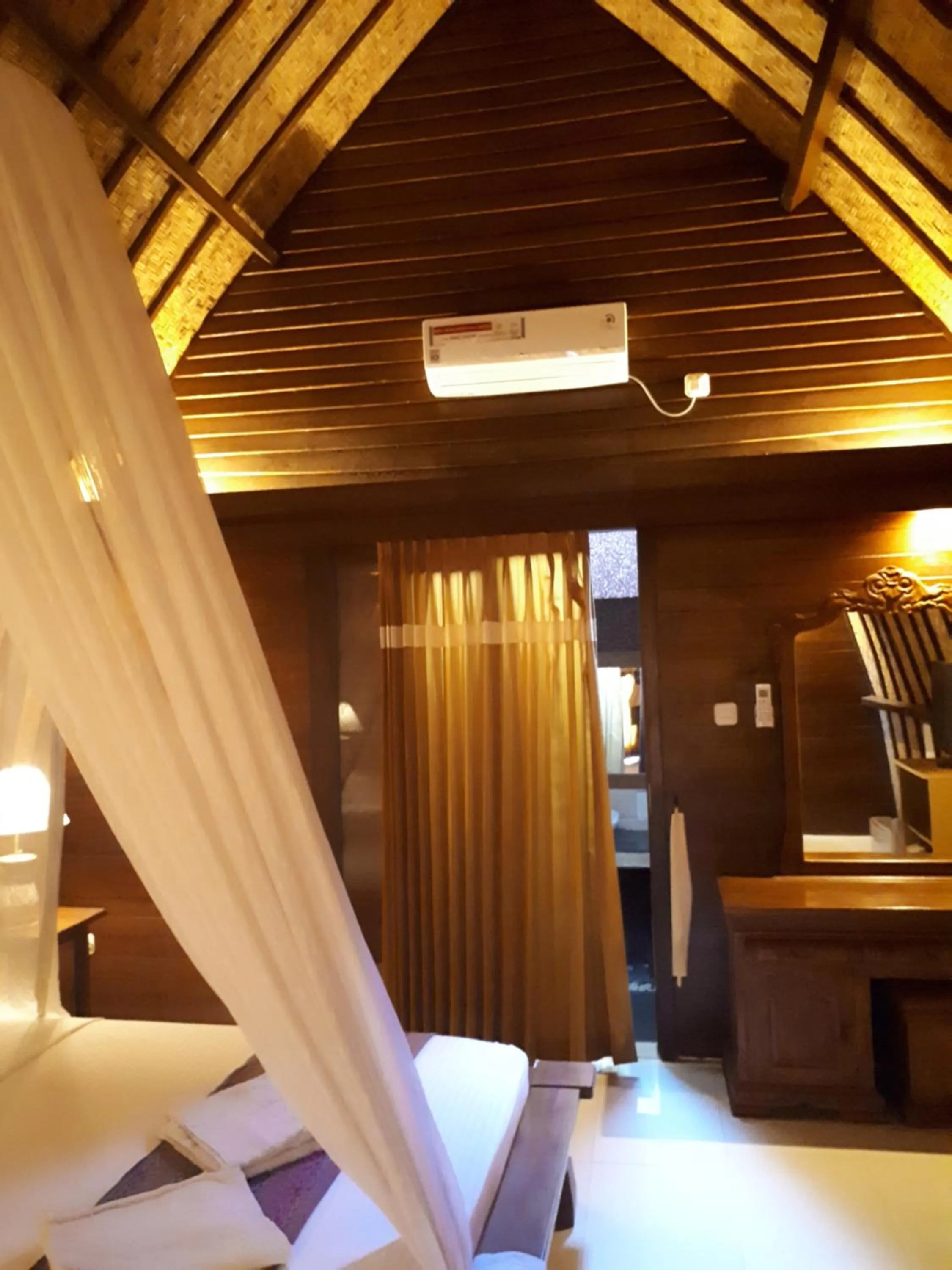 Bed in Sandy Beach Bungalows