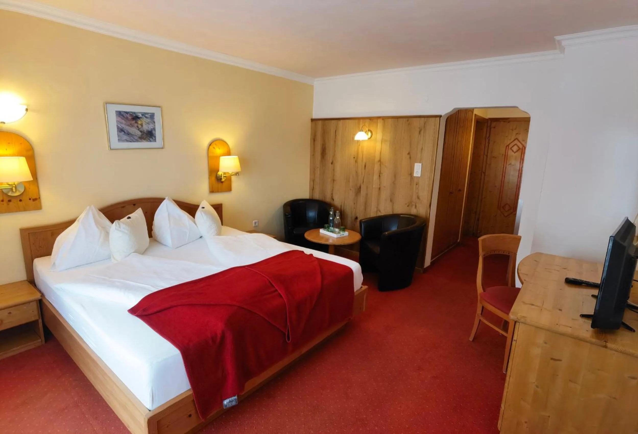 Living room, Bed in Hotel Kärntnerhof & Suiten 3-Stern Superior