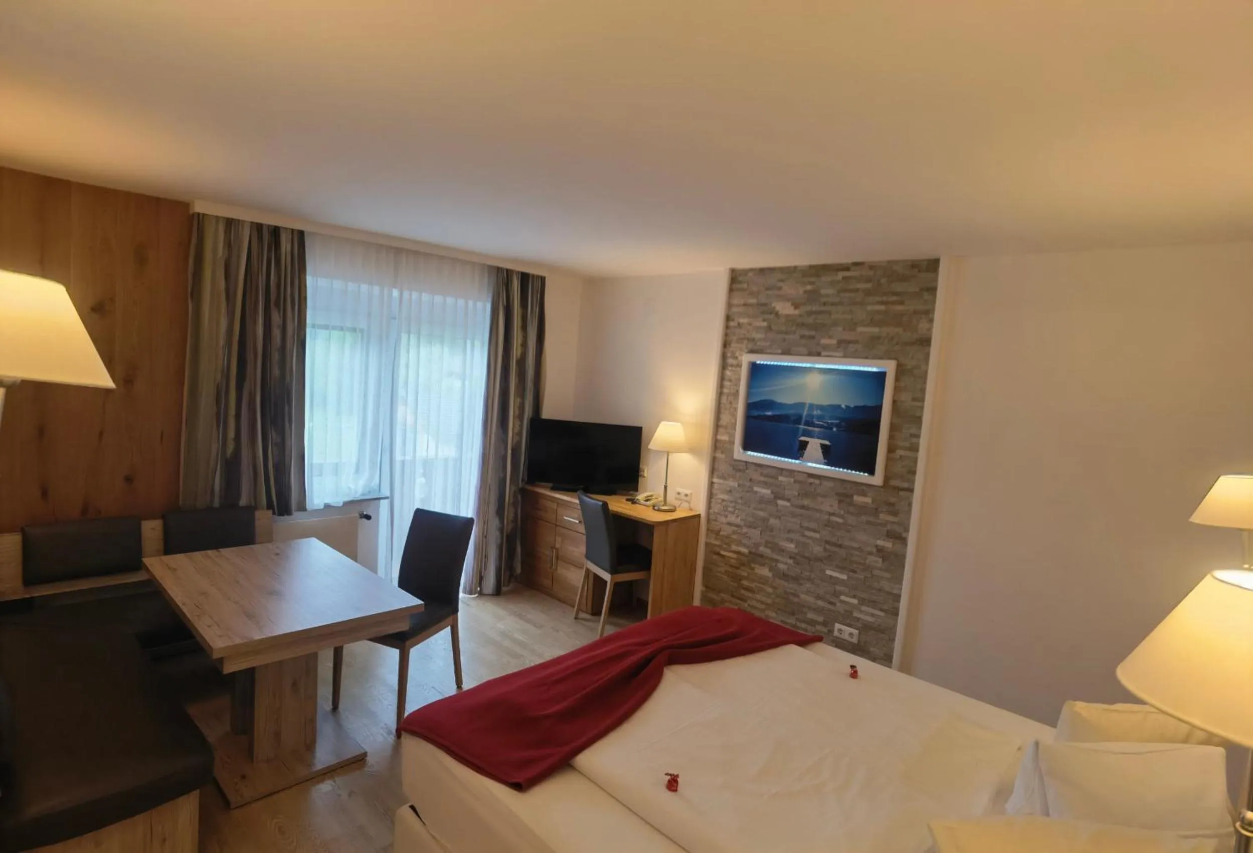 Living room, Bed in Hotel Kärntnerhof & Suiten 3-Stern Superior