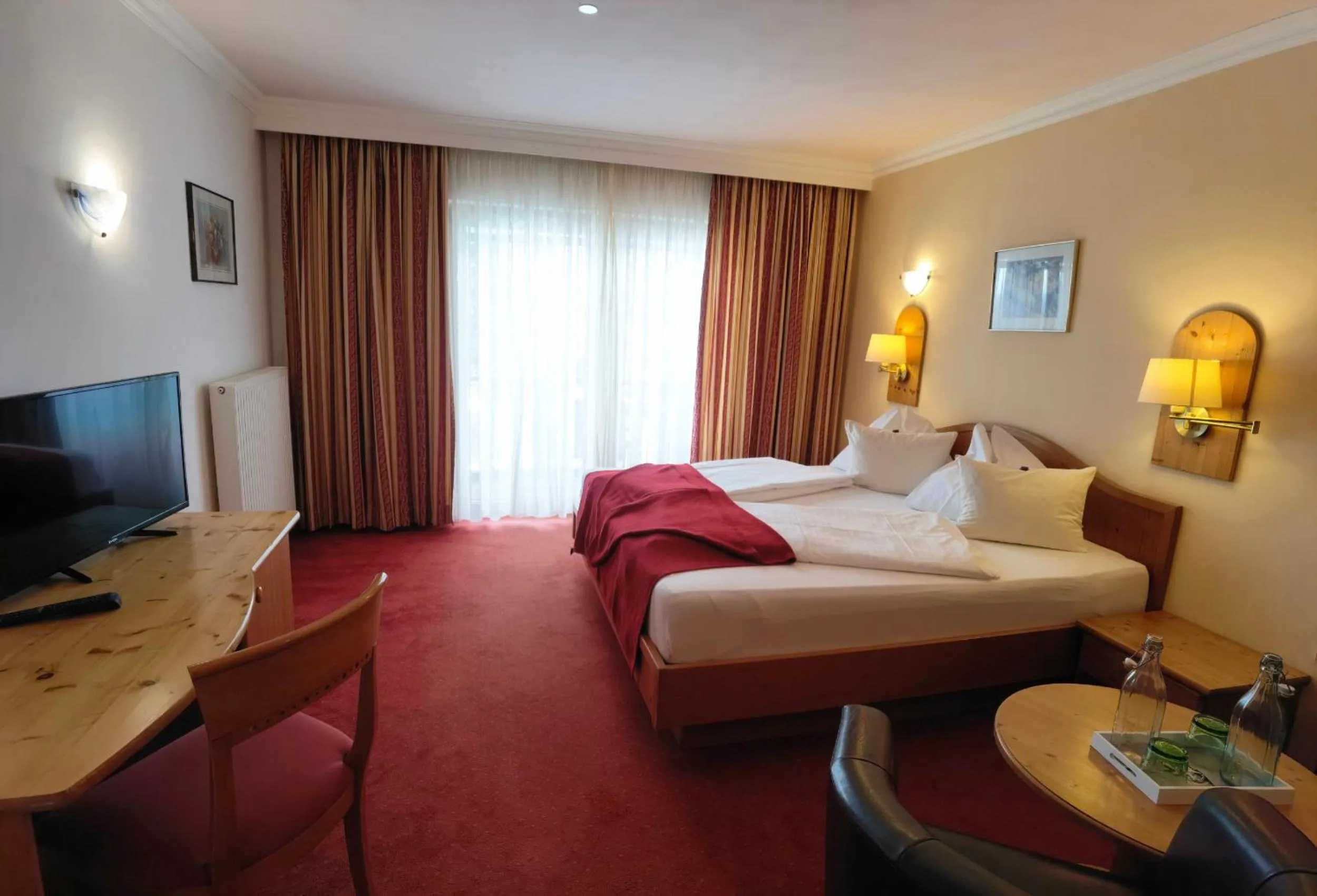 Photo of the whole room, Bed in Hotel Kärntnerhof & Suiten 3-Stern Superior