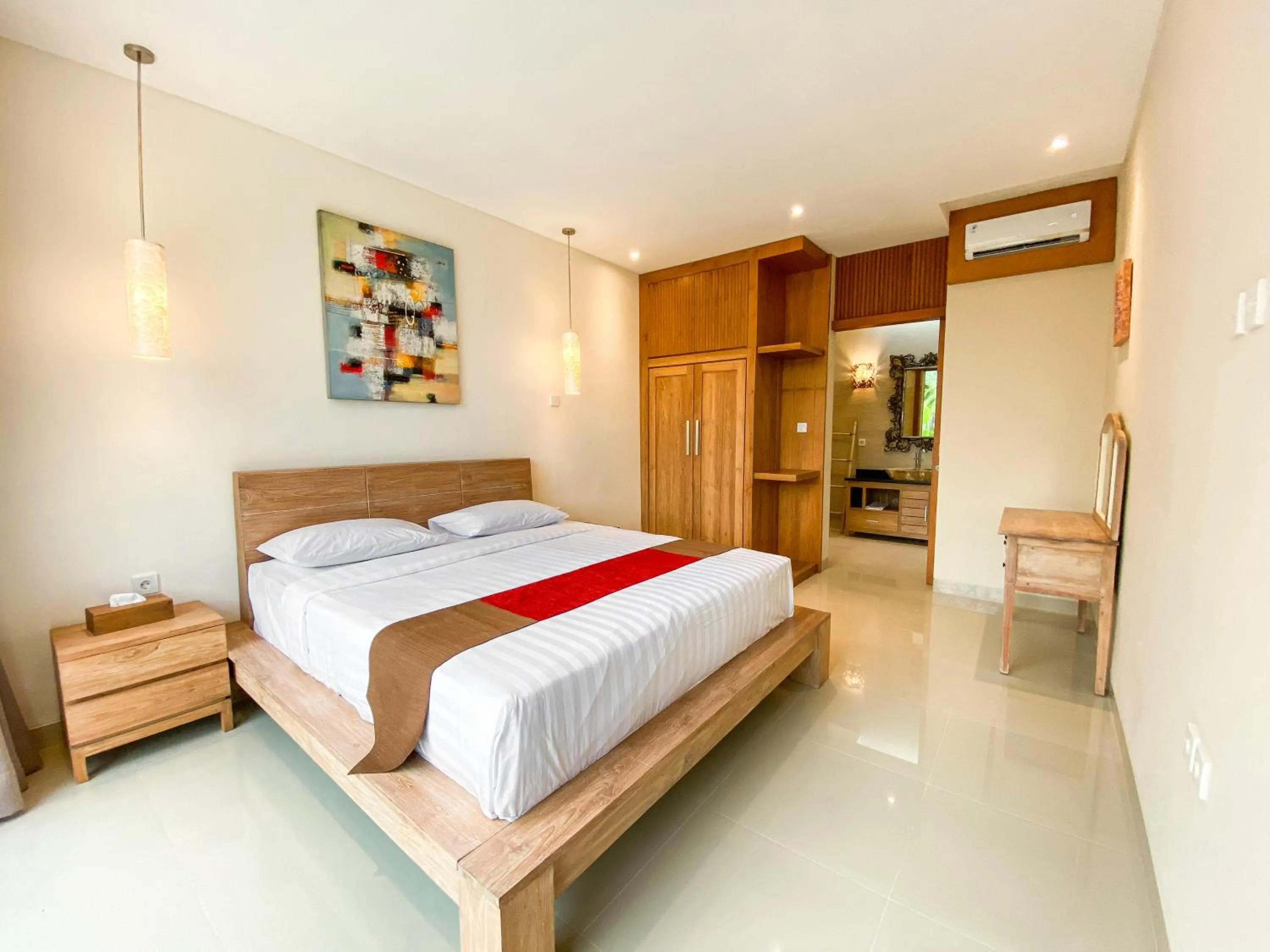 Bed in Svarna Suites Seminyak
