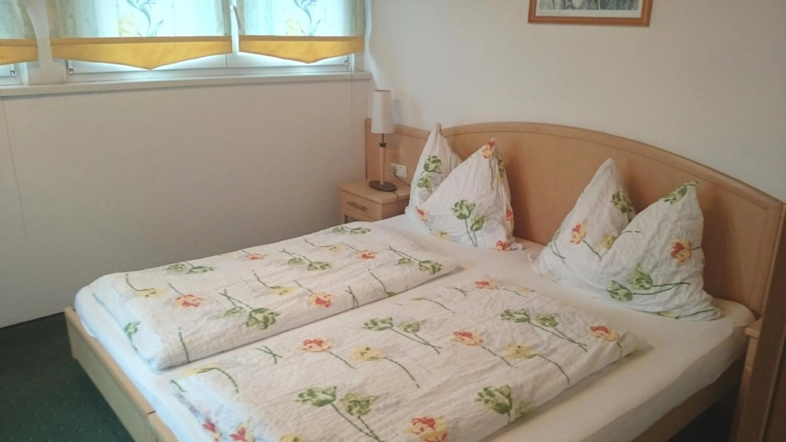 Bed in Alpenhotel Tauernstüberl