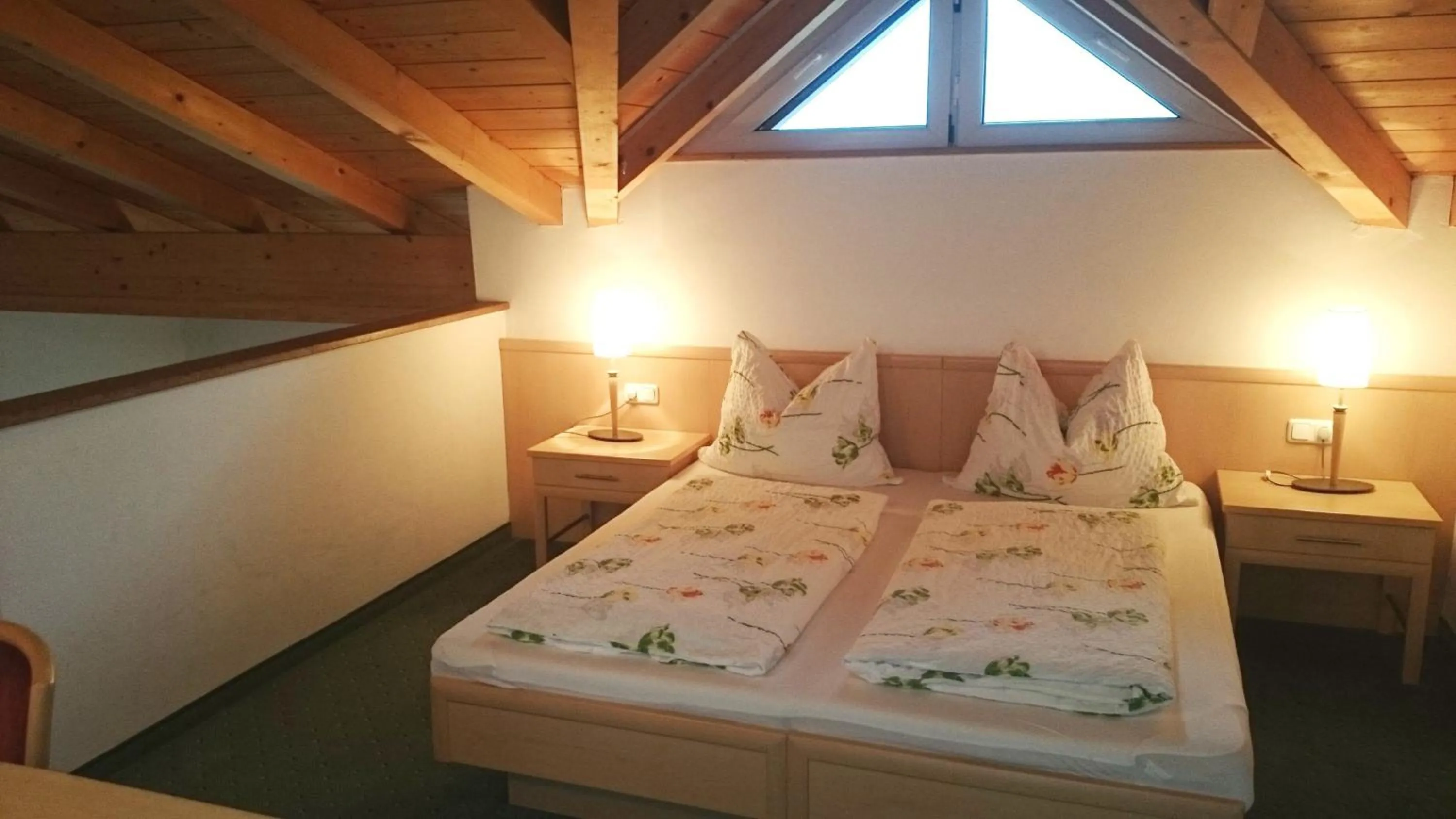 Bed in Alpenhotel Tauernstüberl