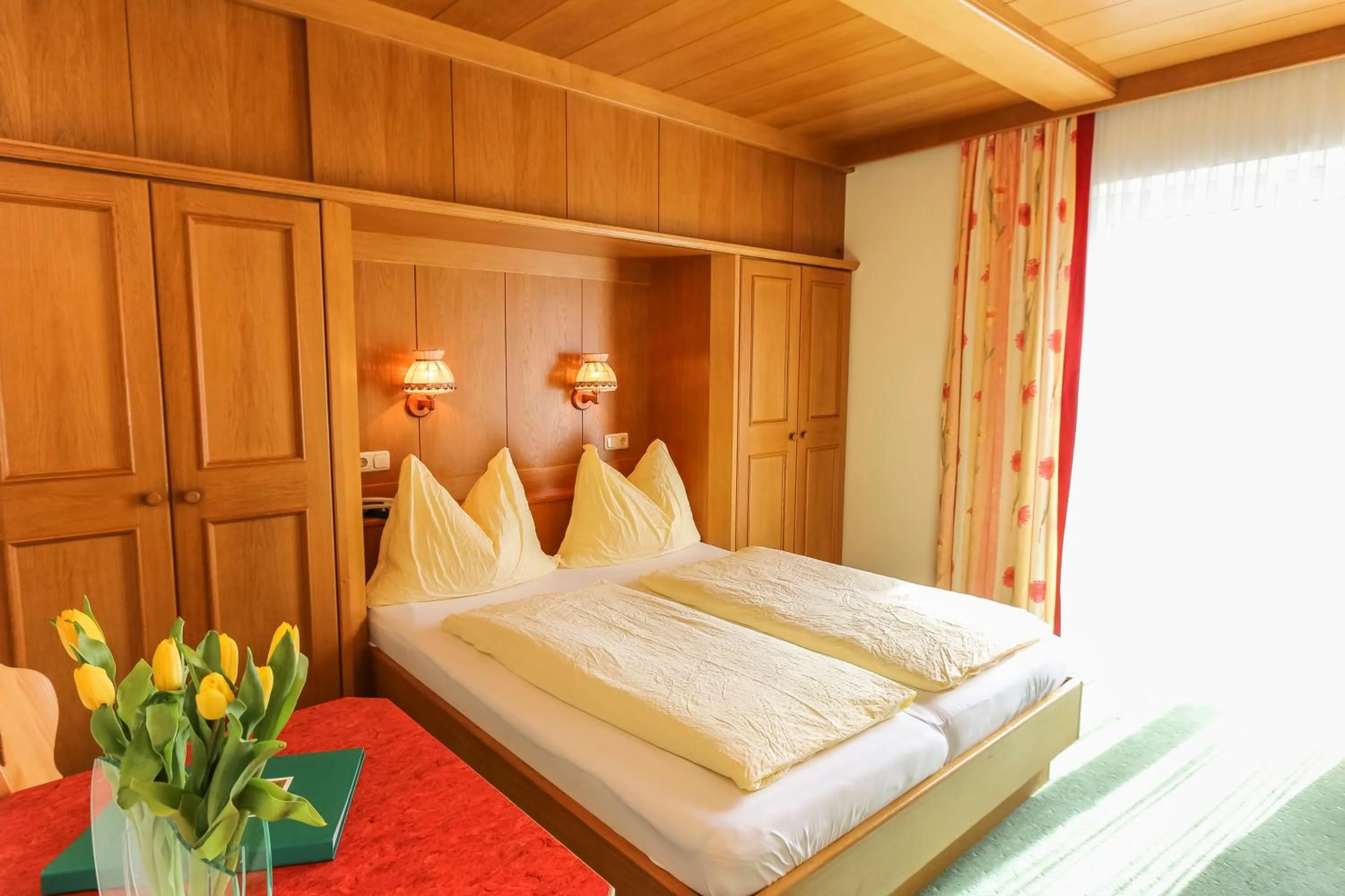 Photo of the whole room, Bed in Alpenhotel Tauernstüberl