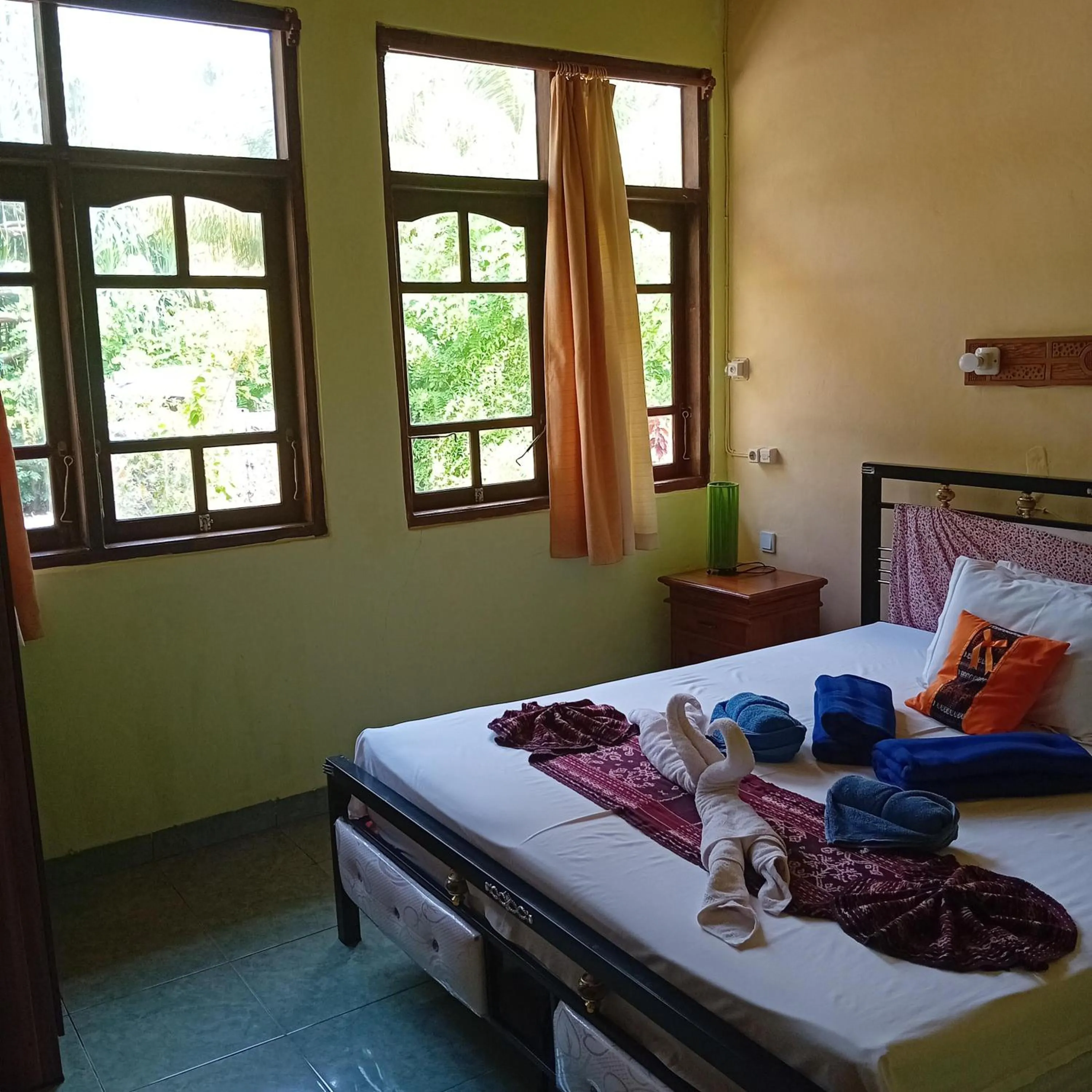 Bed in Budi Sun Resort, Flores, Maumere