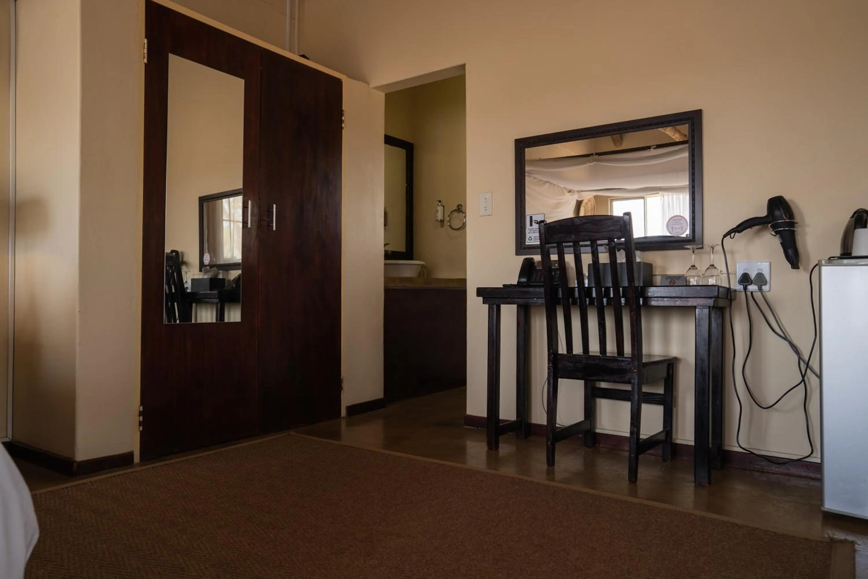 Bedroom in Tshukudu Game Lodge