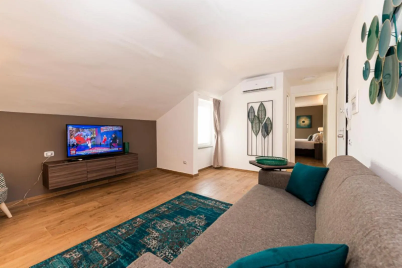 Communal lounge/ TV room in Aurelia Antica Suites & Apartments