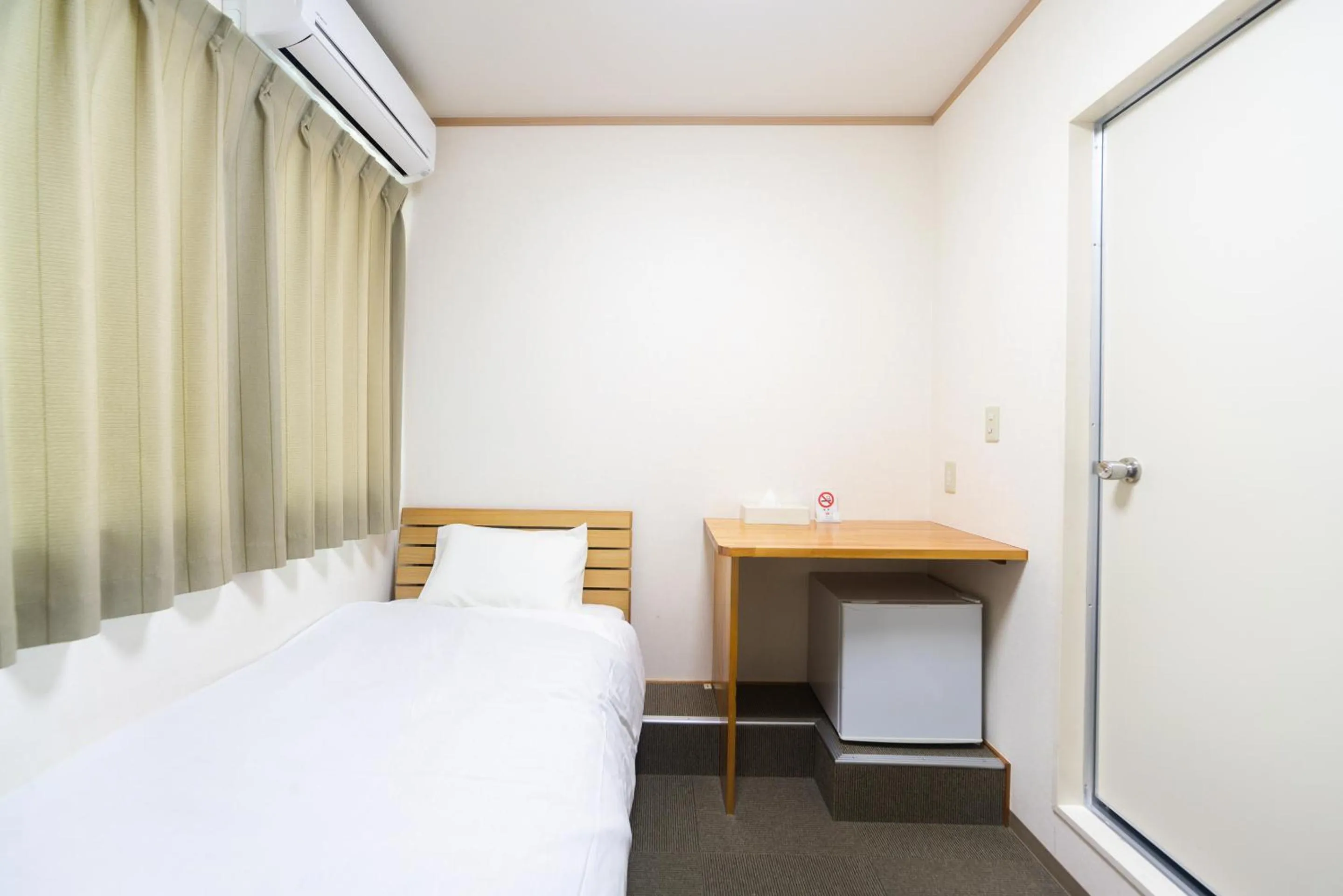 Bed in Tabist Hotel Daimu Minami-Souma