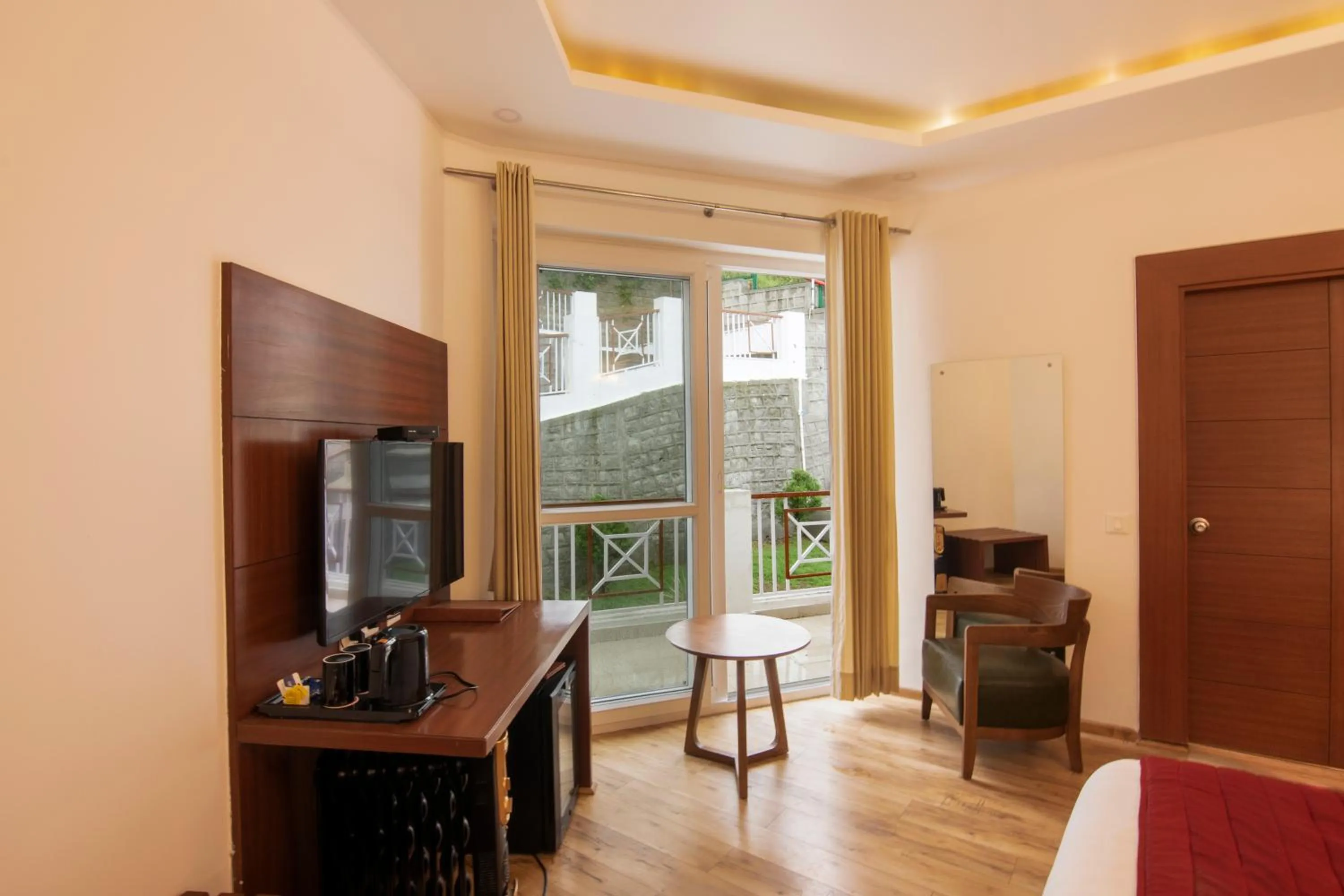 Seating area, Bed in Himalayan Splendour Resort