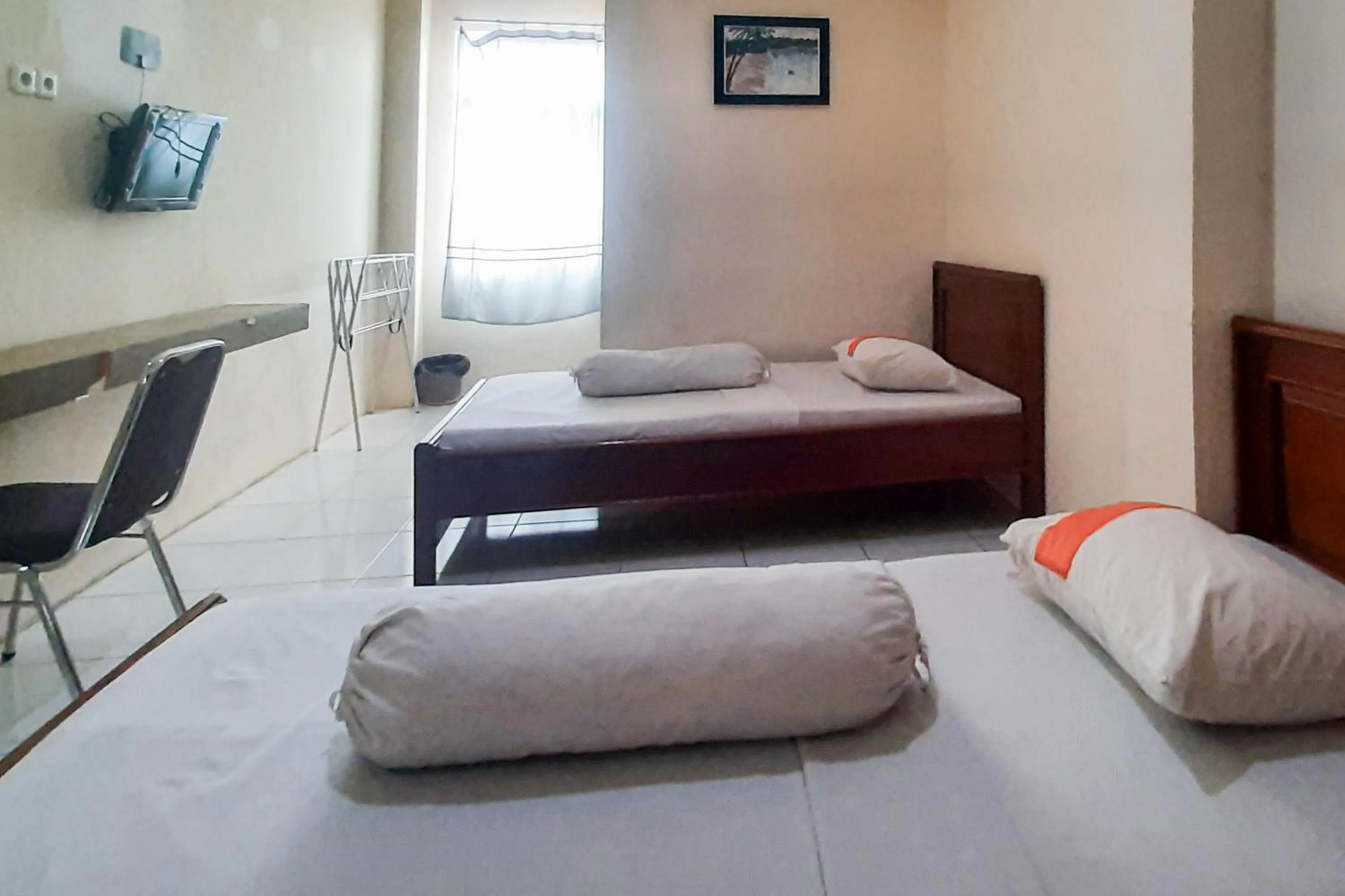Bed in RedDoorz Syariah At Penginapan Sederhana Palembang