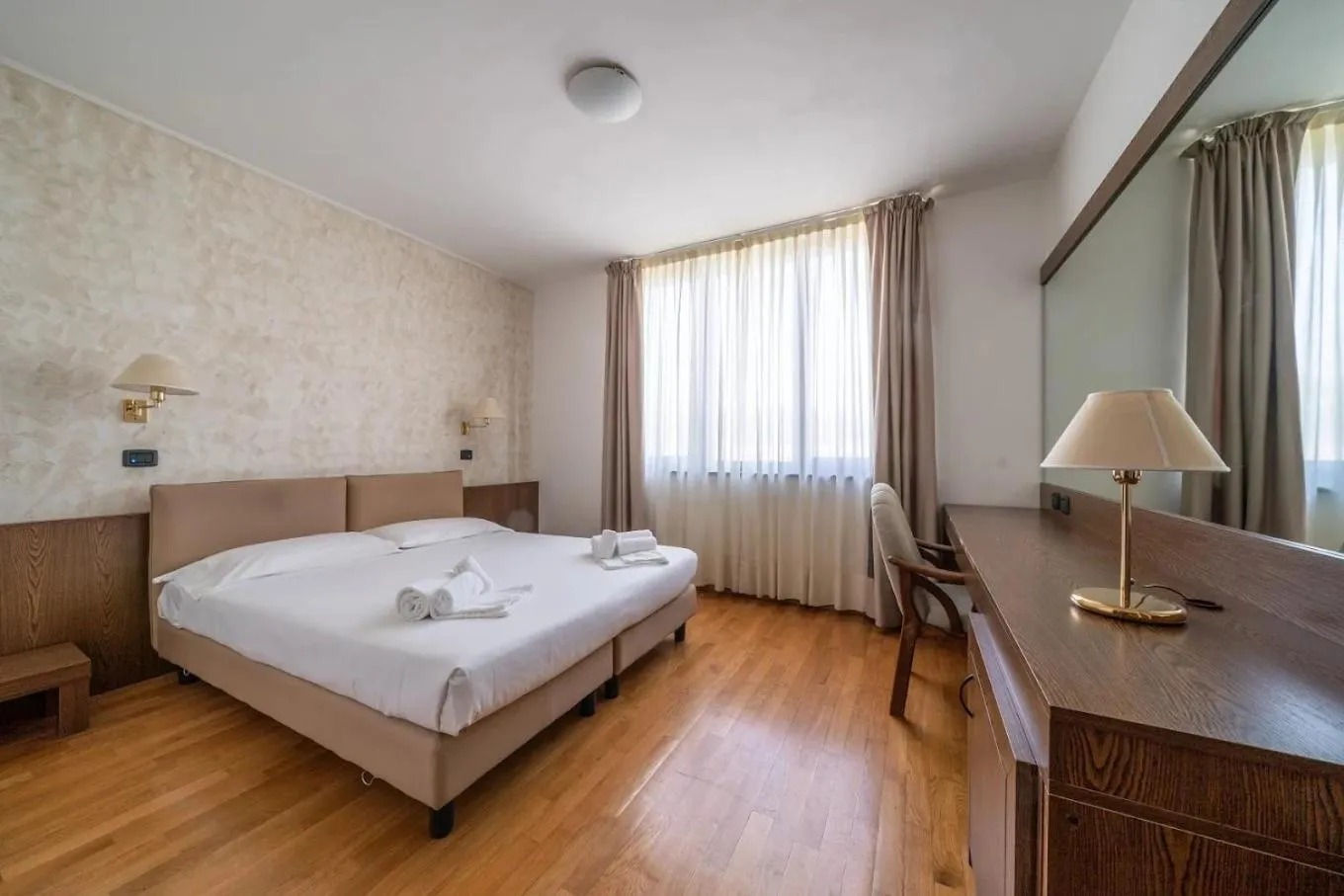 Bed in HOTEL CAVALIERI