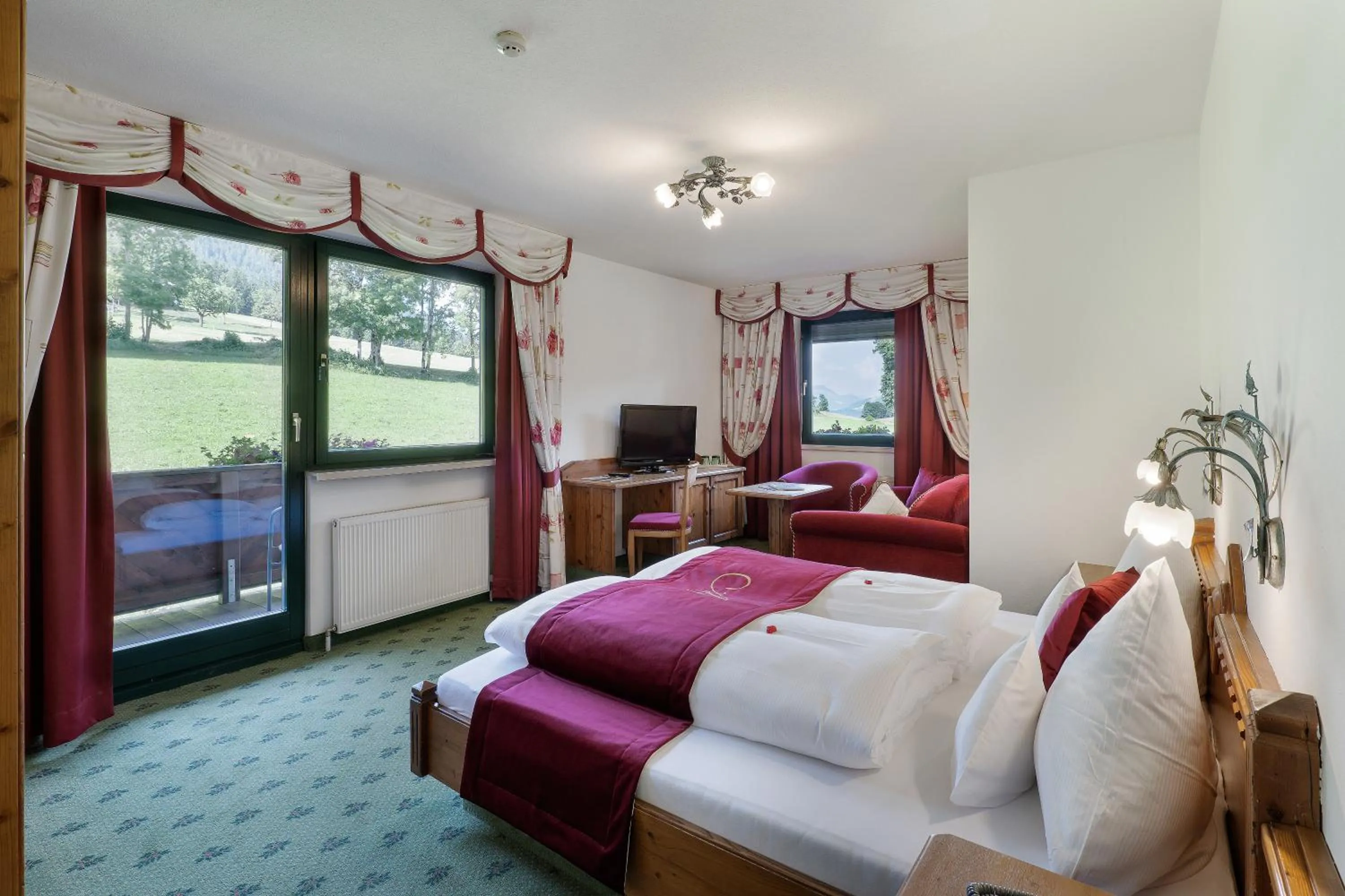 Photo of the whole room, Bed in Hotel AlpenSchlössl