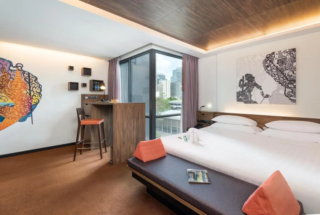 Seating area, Bed in Maitria Mode Sukhumvit 15 Bangkok - A Chatrium Collection