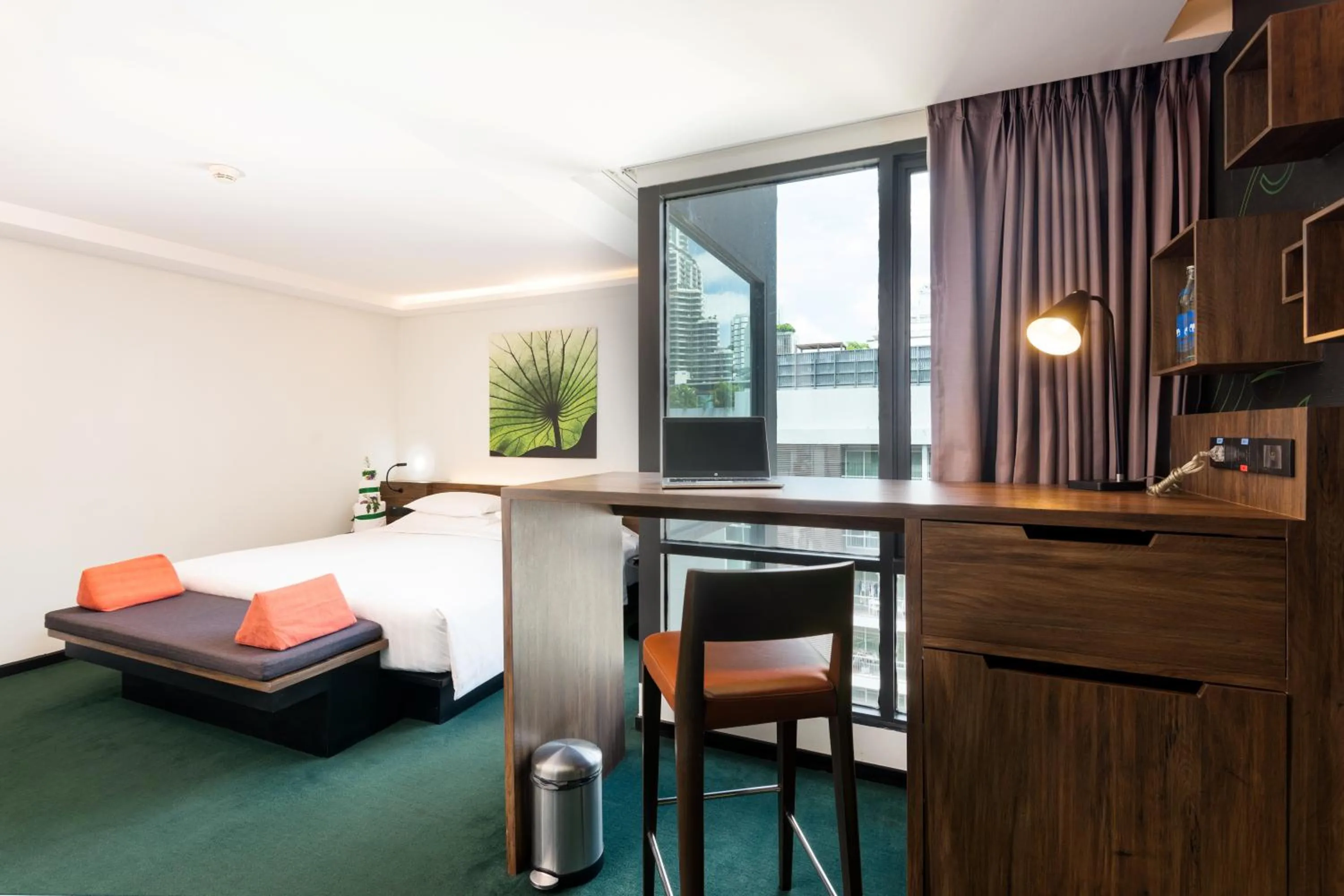 Seating area, Bed in Maitria Mode Sukhumvit 15 Bangkok - A Chatrium Collection