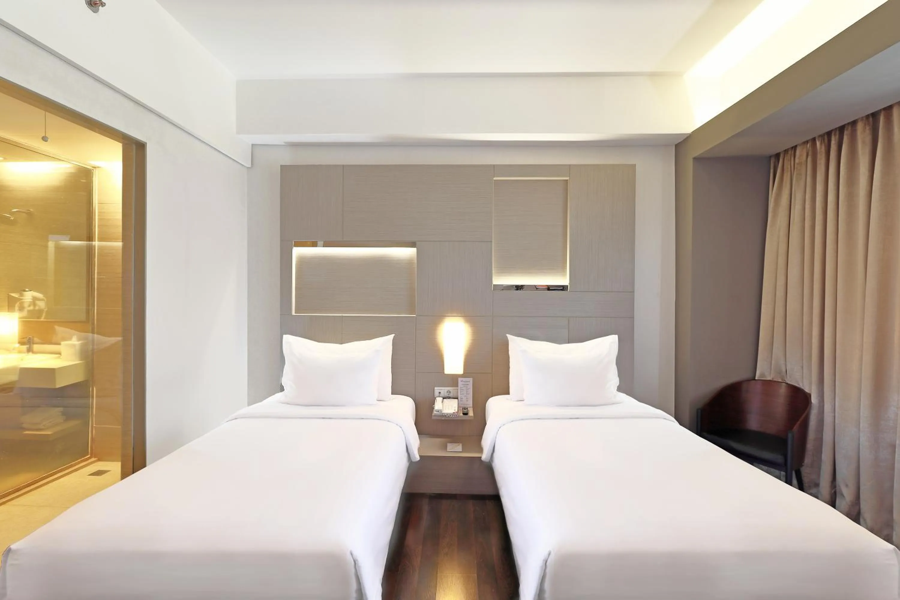 Bed in Swiss-Belhotel Cirebon