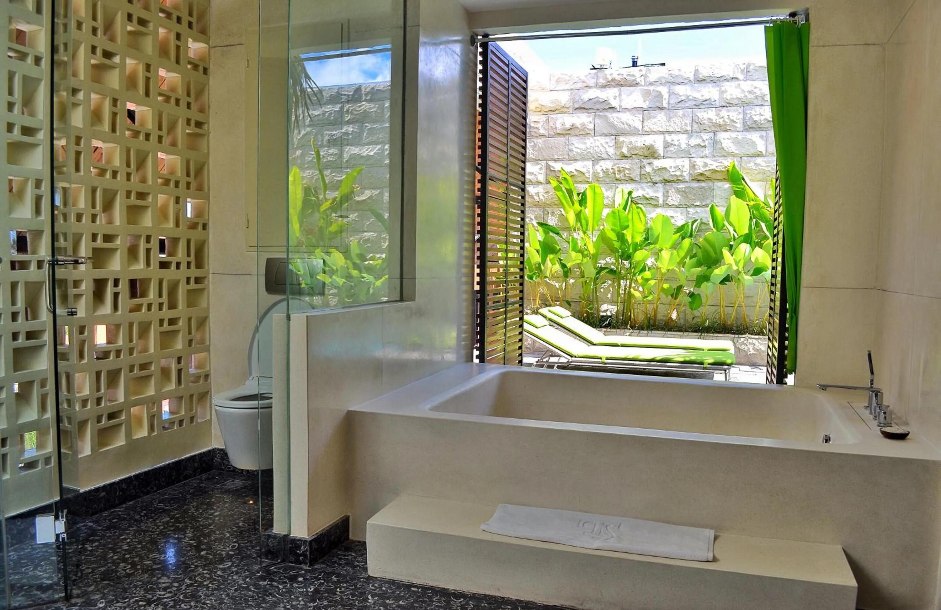 Bath in TS SUITES Seminyak Bali