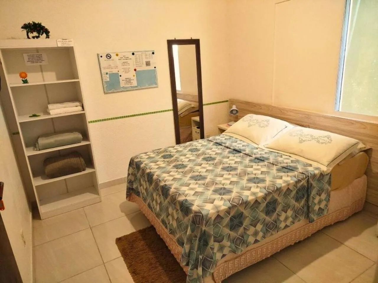 Bed in Pousada Executiva SolRiso Aeroporto Florianópolis