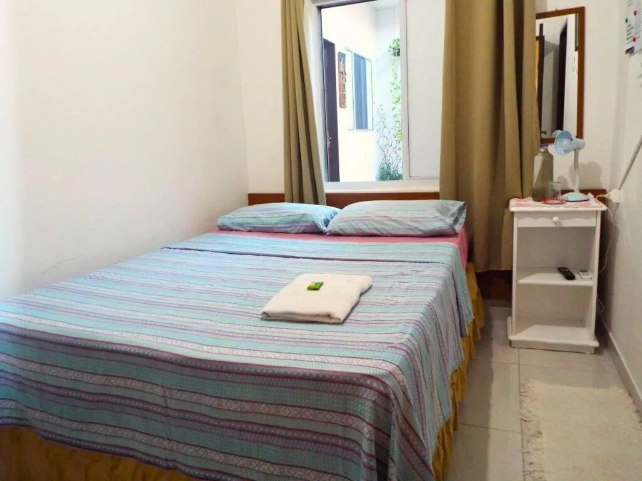 Bed in Pousada Executiva SolRiso Aeroporto Florianópolis