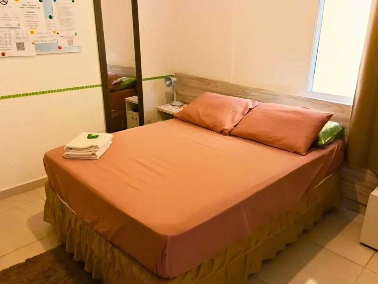 Bed in Pousada Executiva SolRiso Aeroporto Florianópolis