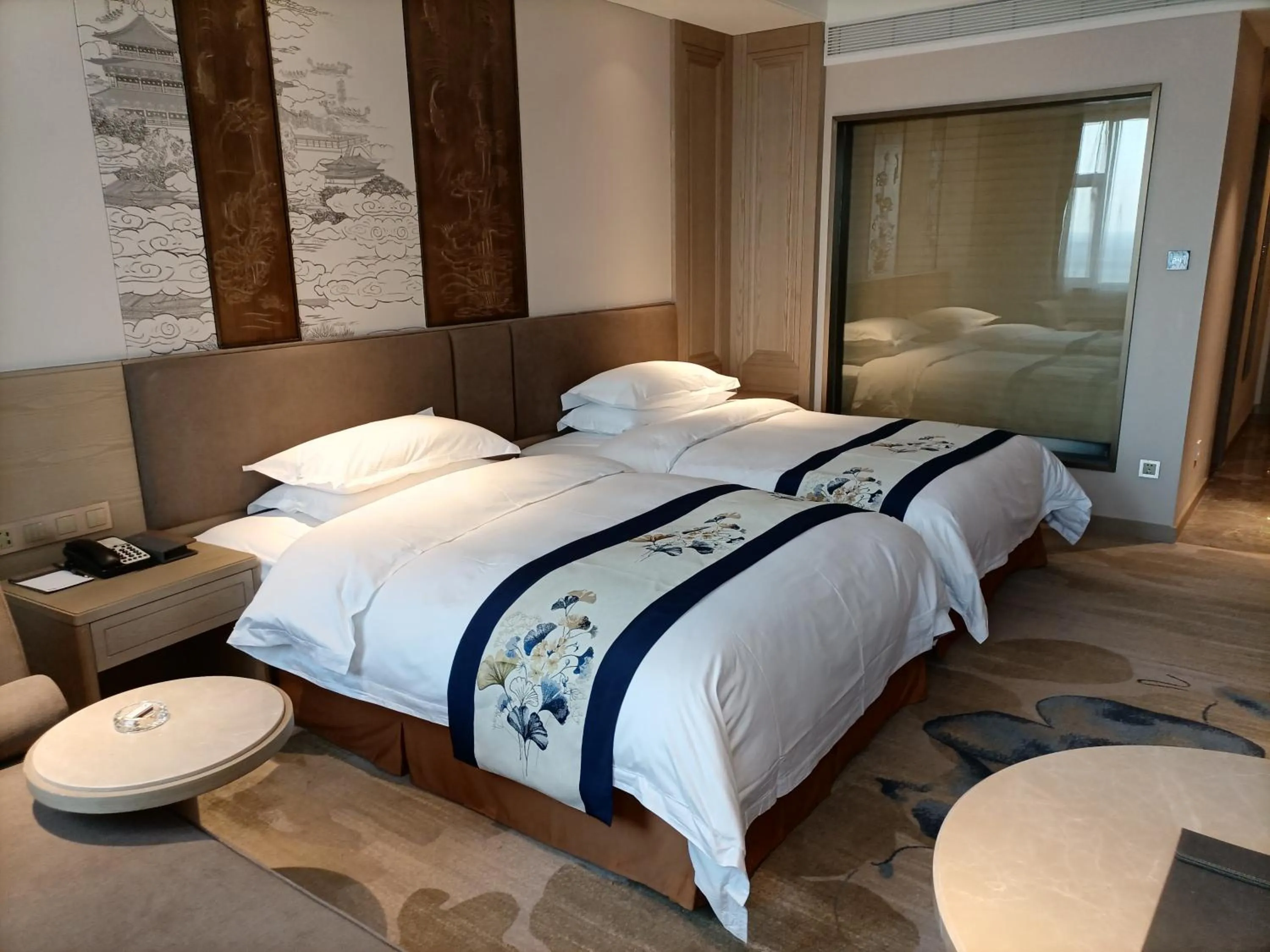 Bed in Baoying Jinling Hotel