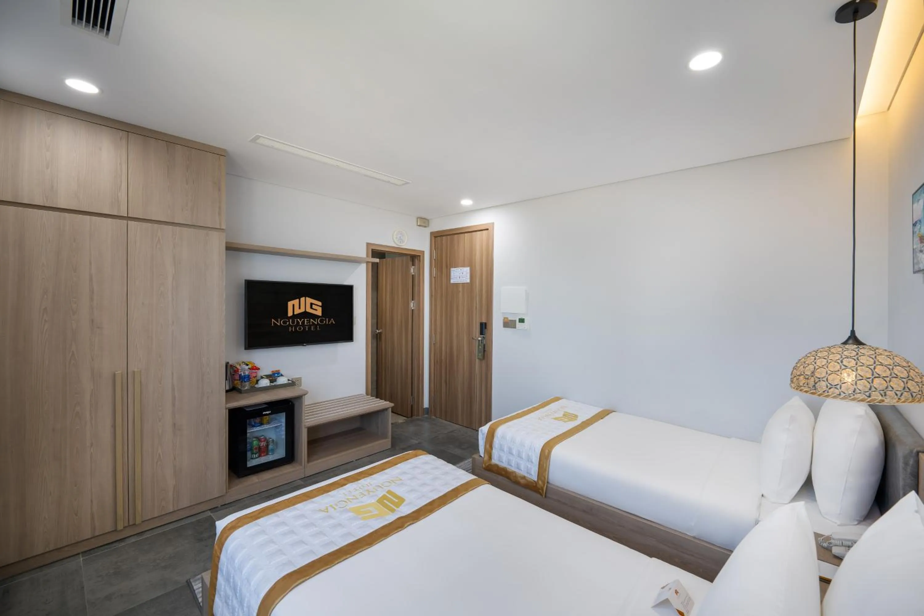 Bed in Nguyen Gia Hotel