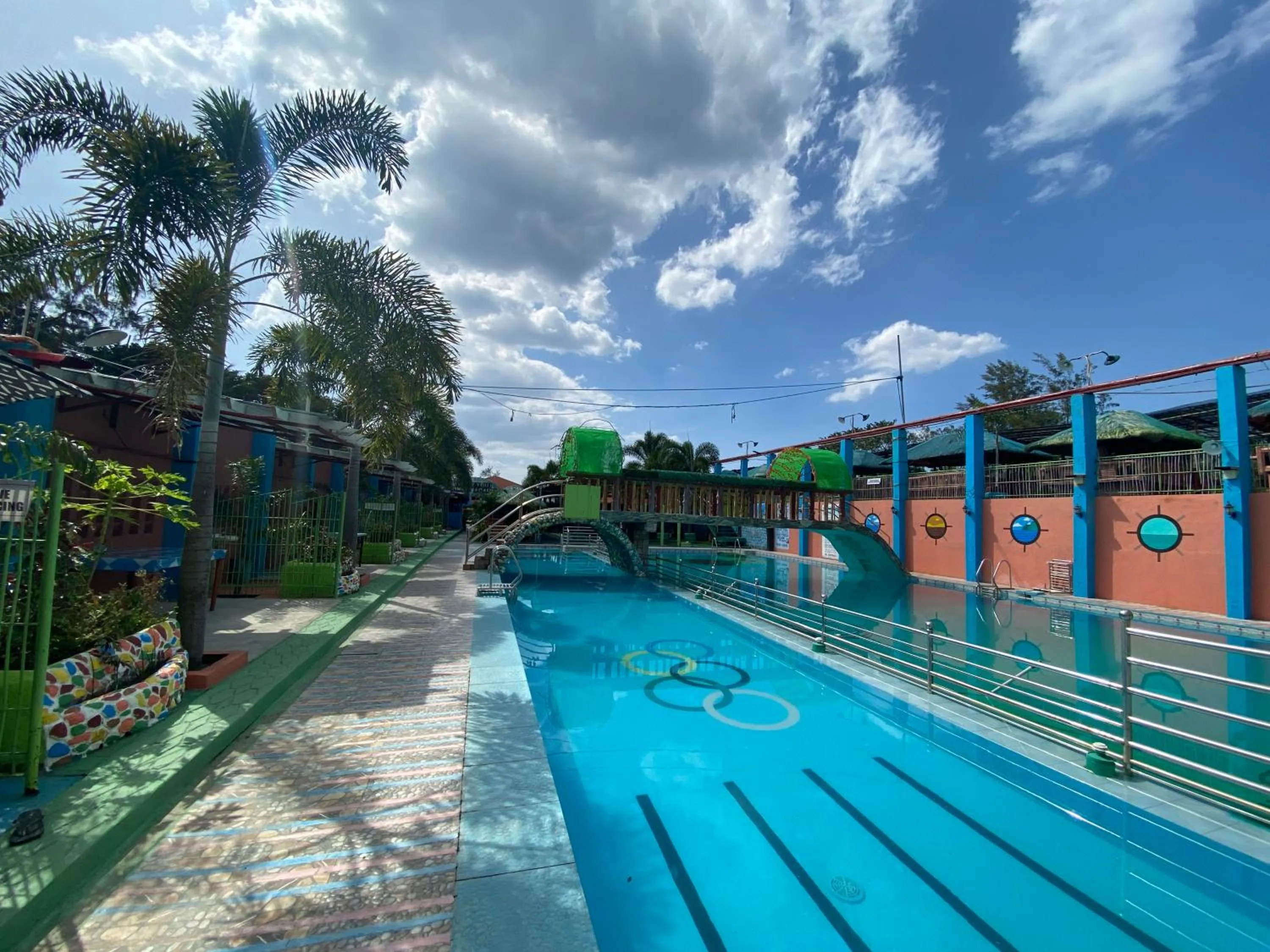 Swimming pool in RedDoorz Plus @ Lhexlyn Resort San Narciso