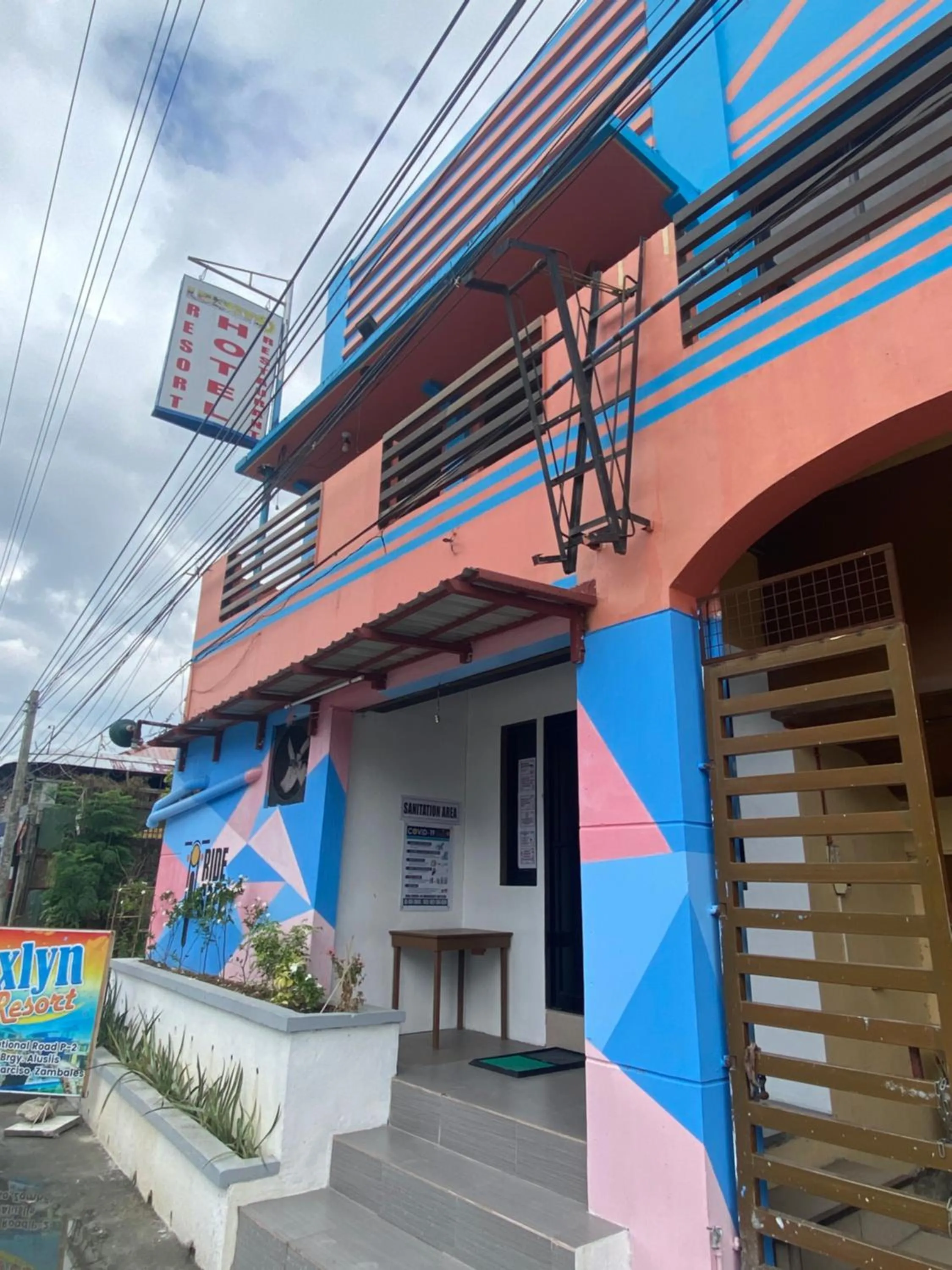 Property building in RedDoorz Plus @ Lhexlyn Resort San Narciso