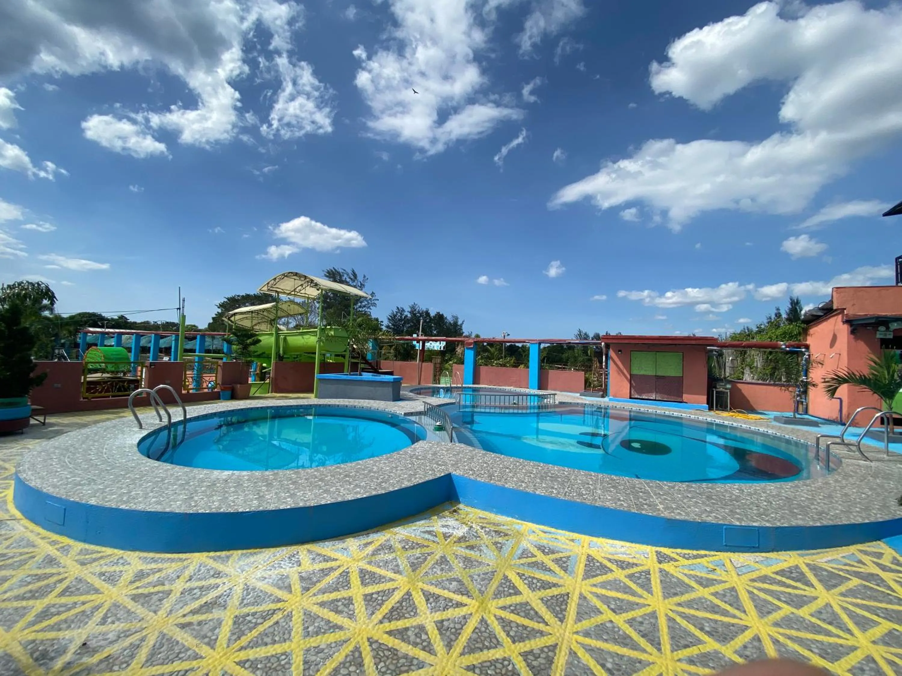 Swimming pool in RedDoorz Plus @ Lhexlyn Resort San Narciso