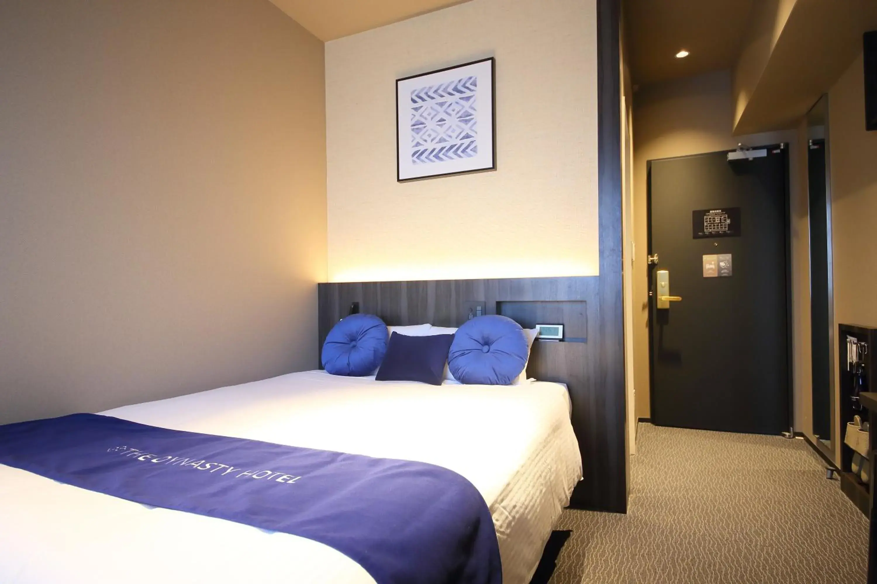 Bed in Dynasty Hotel & Resort Osaka Bed in Dynasty Hotel & Resort Osaka