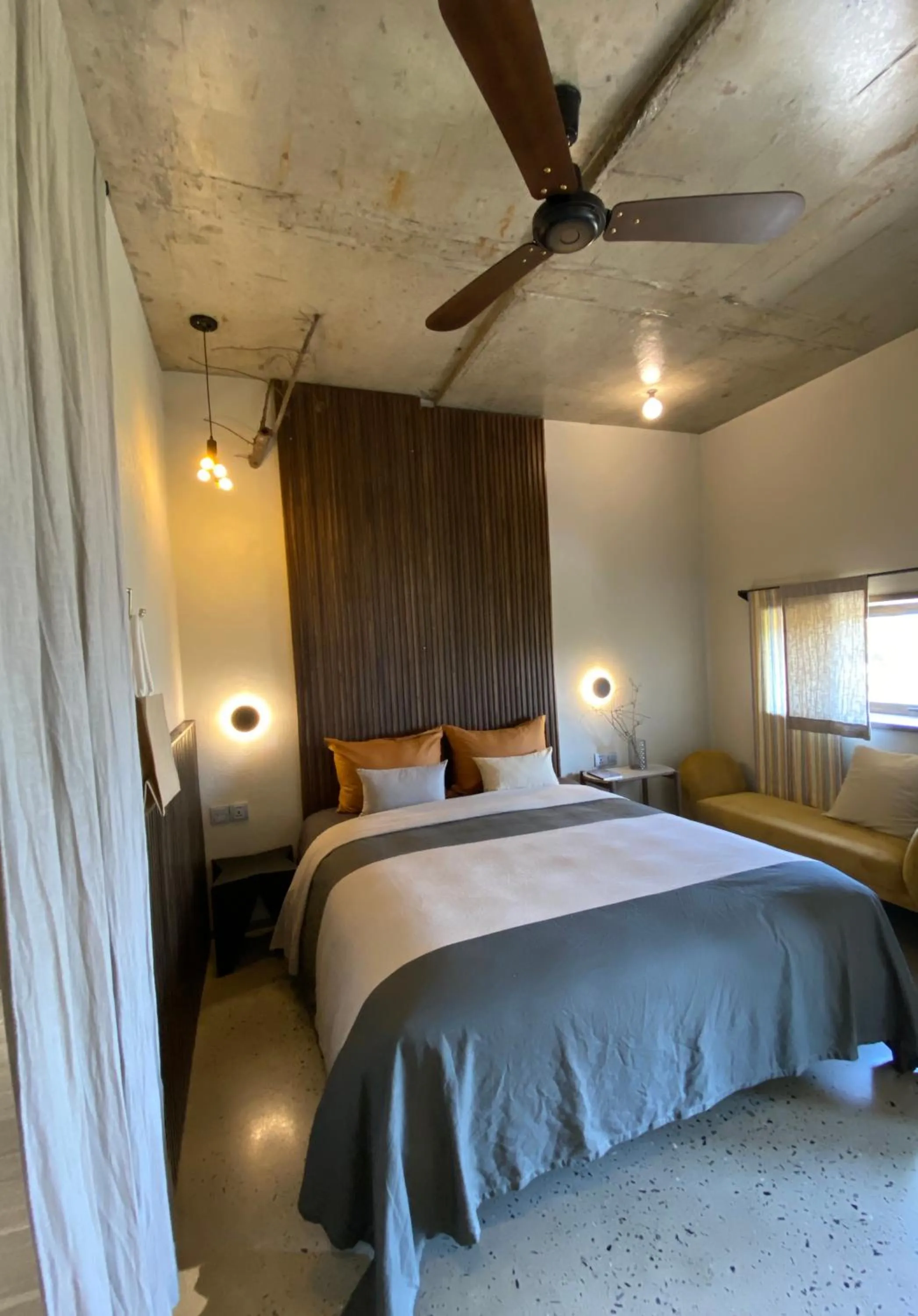 Bed in Kaia Gallery Hotel Hoi An