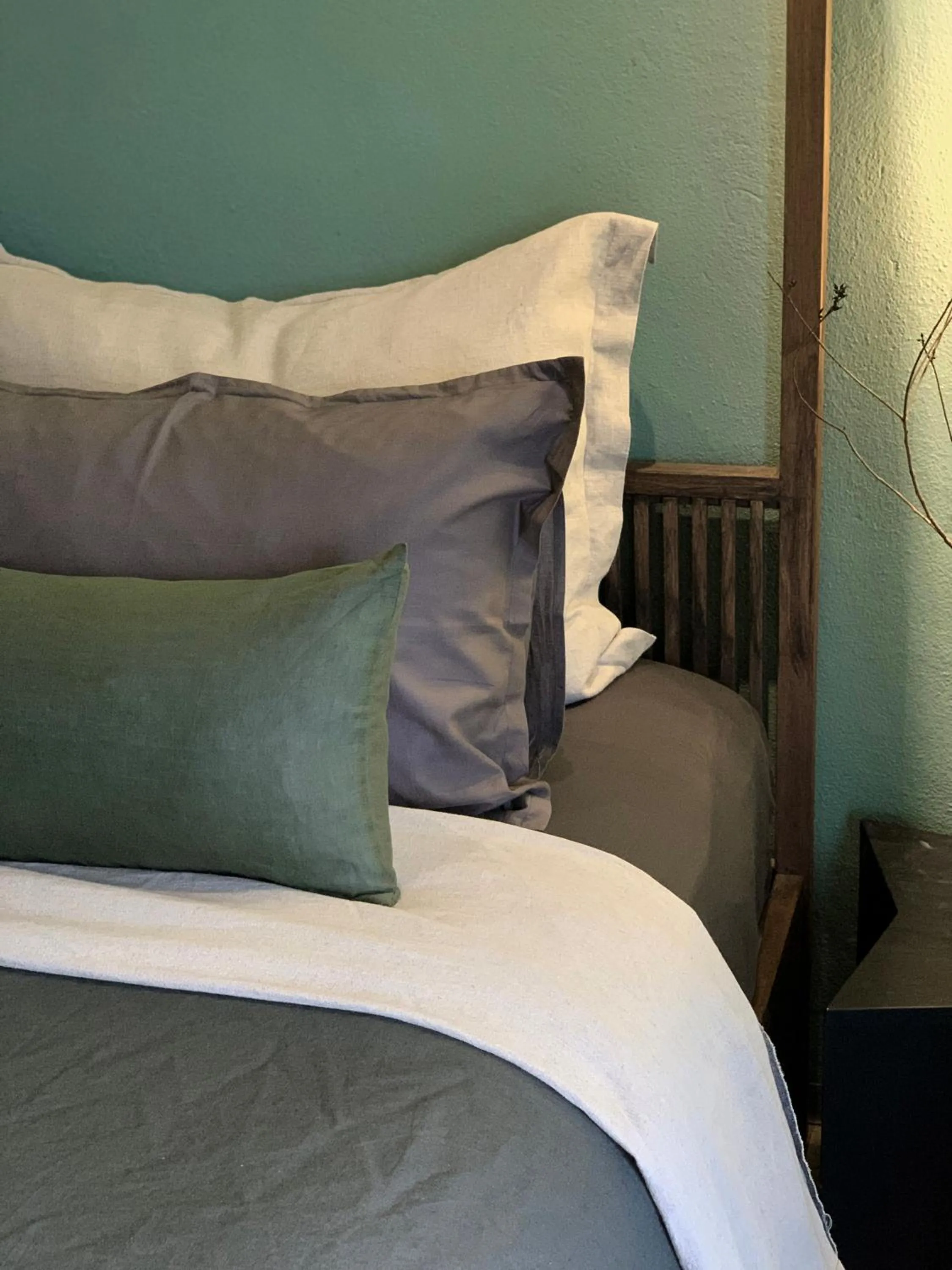 Bed in Kaia Gallery Hotel Hoi An