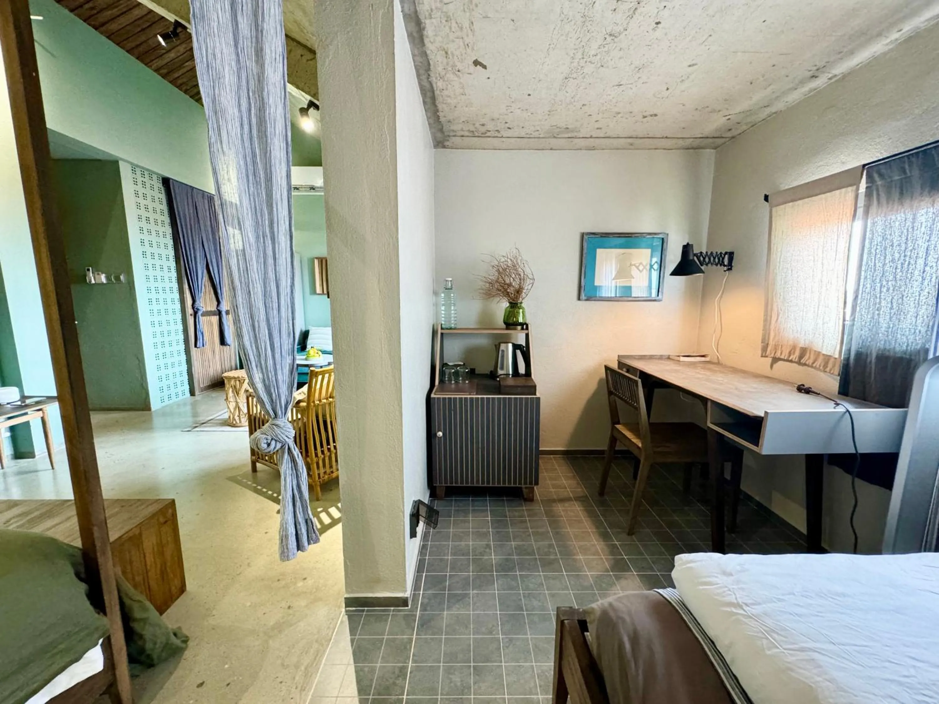 Seating area, Bed in Kaia Gallery Hotel Hoi An