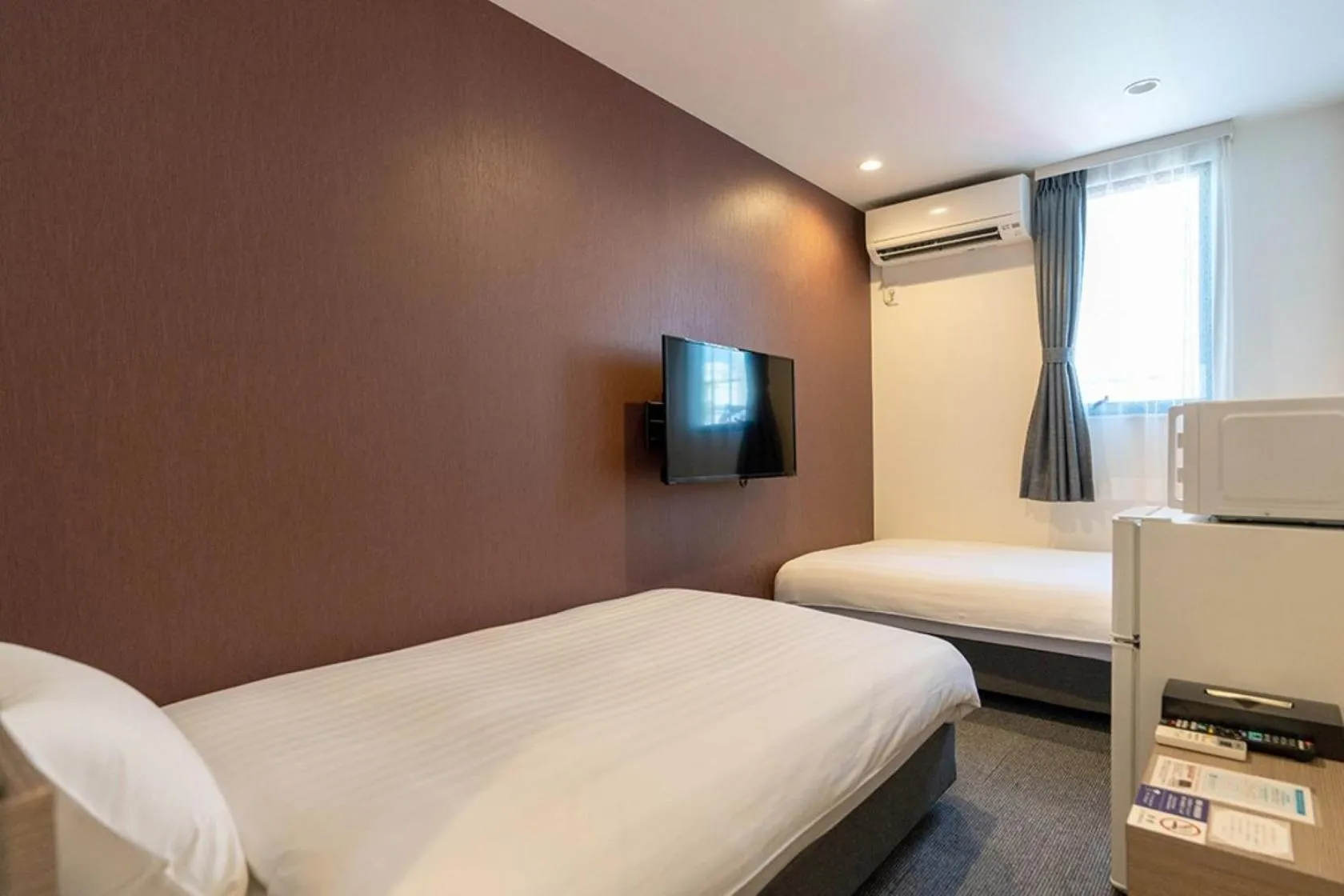 Photo of the whole room, Bed in HOTEL R9 The Yard Yuki