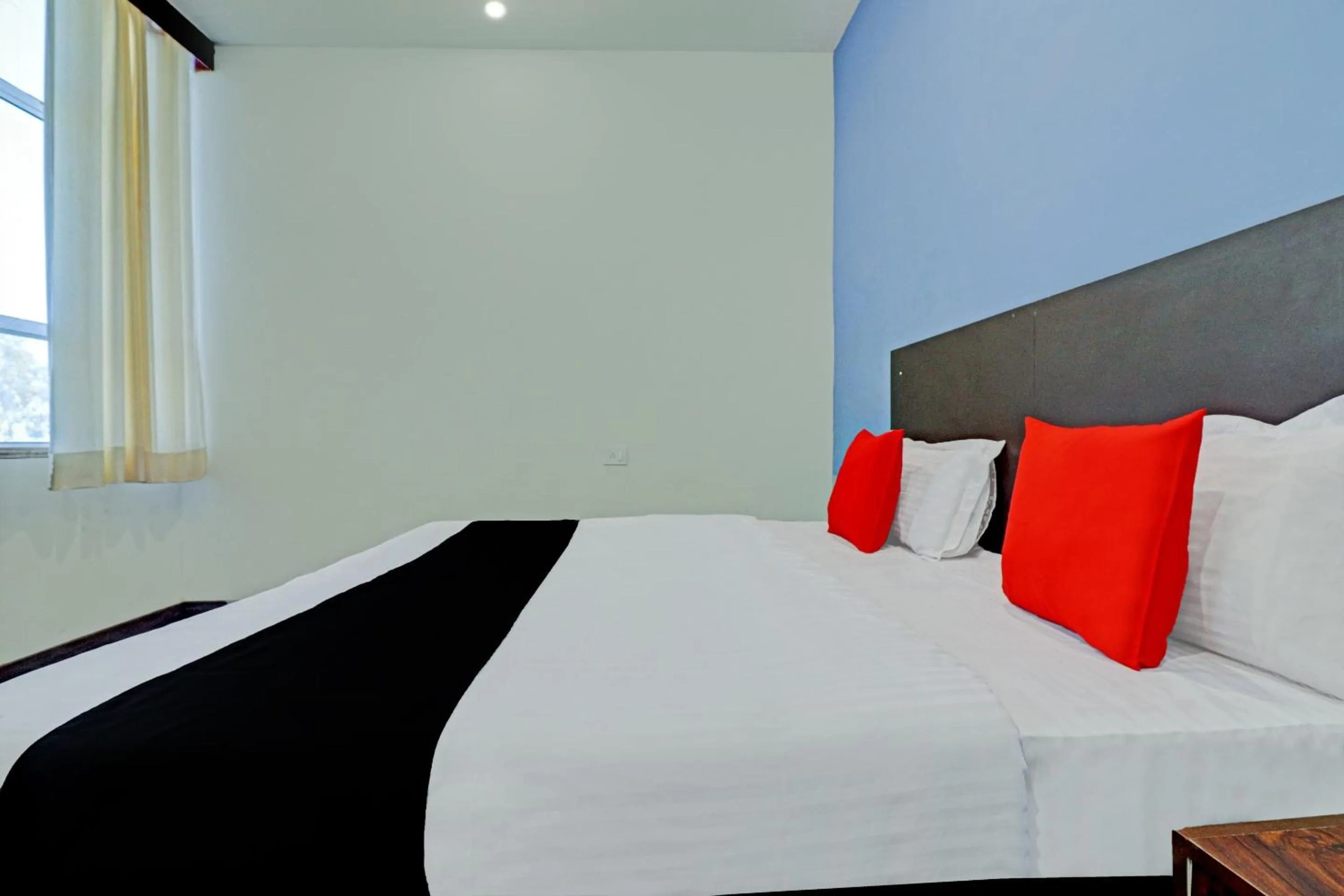 Bedroom, Bed in Capital O Kanha Resort