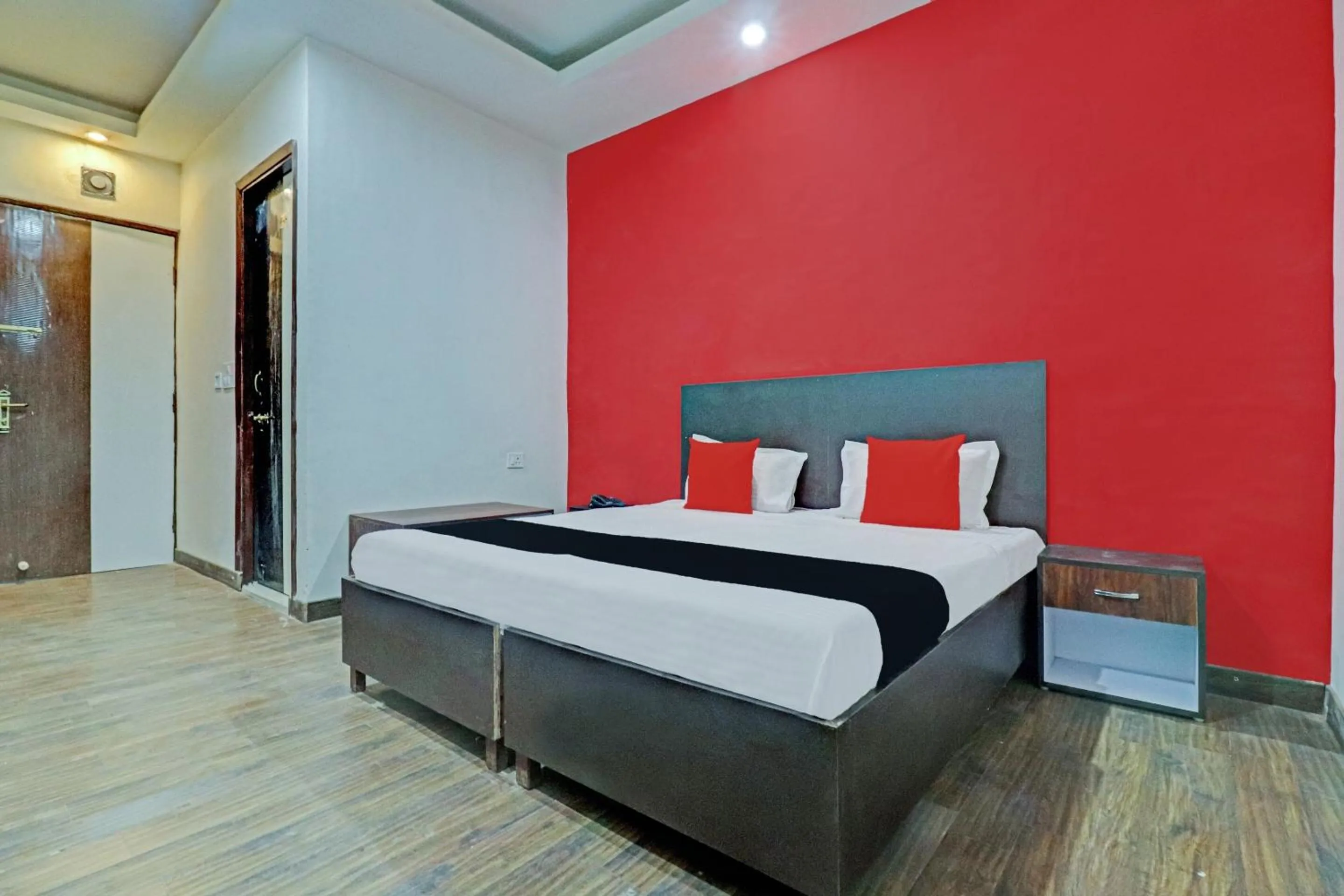 Bedroom in Capital O Kanha Resort