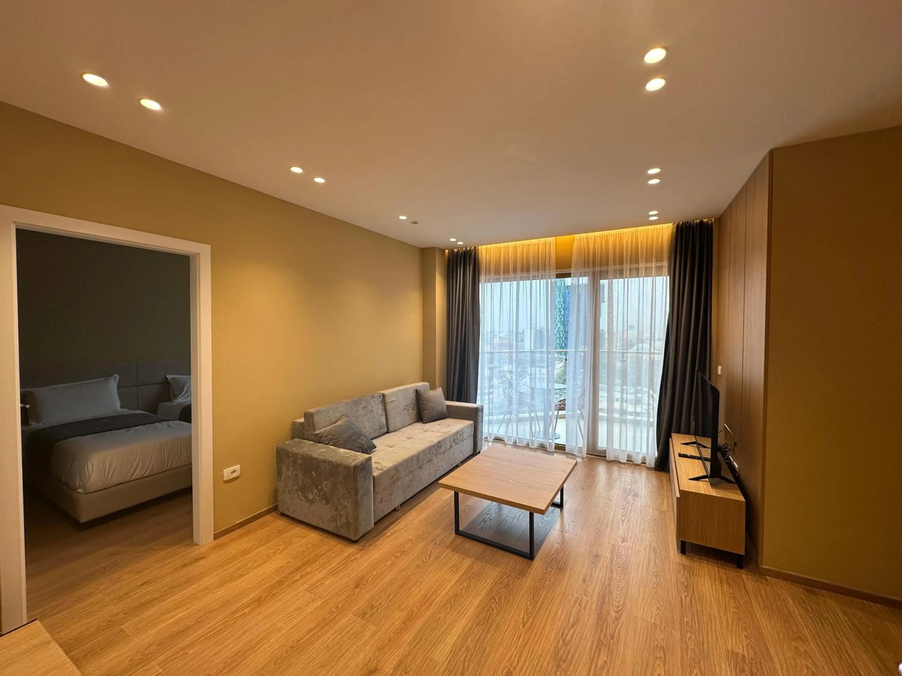 Living room, Bed in Mulaj Hotel