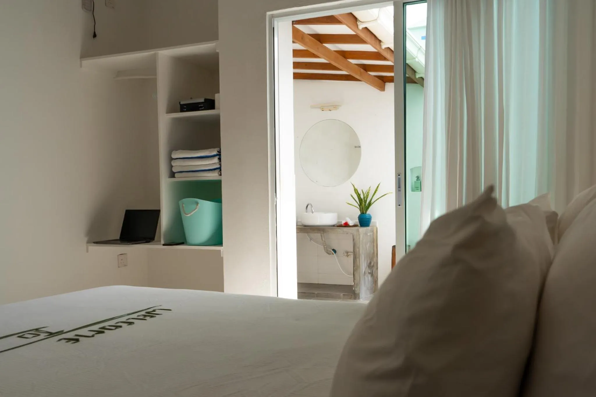 Bed in Vaali Maldives Island Escapes & Dive